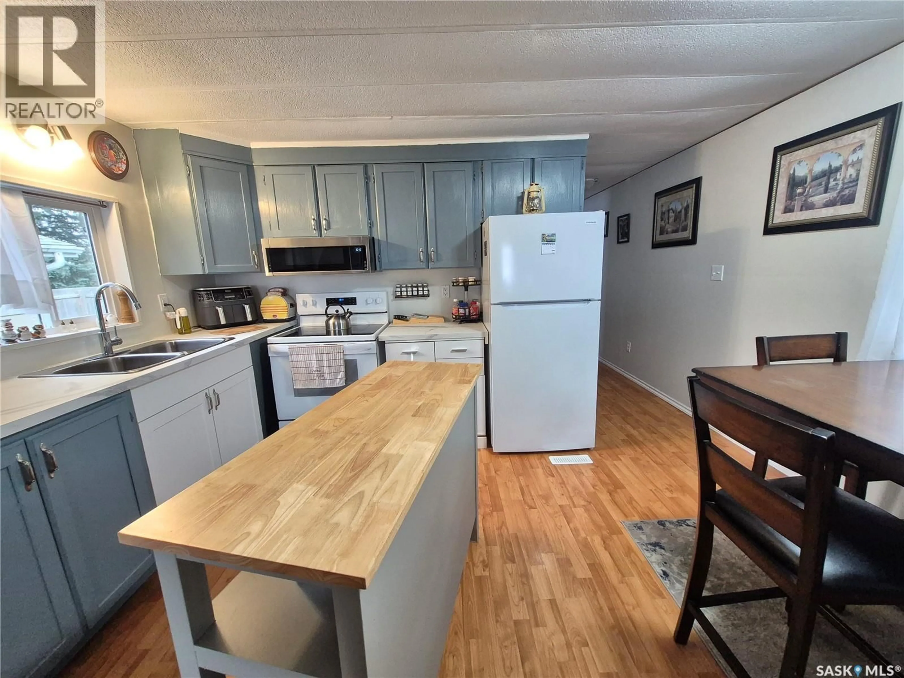 Standard kitchen, wood/laminate floor for 211 PRAIRIE STREET, Yellow Grass Saskatchewan S0G5J0