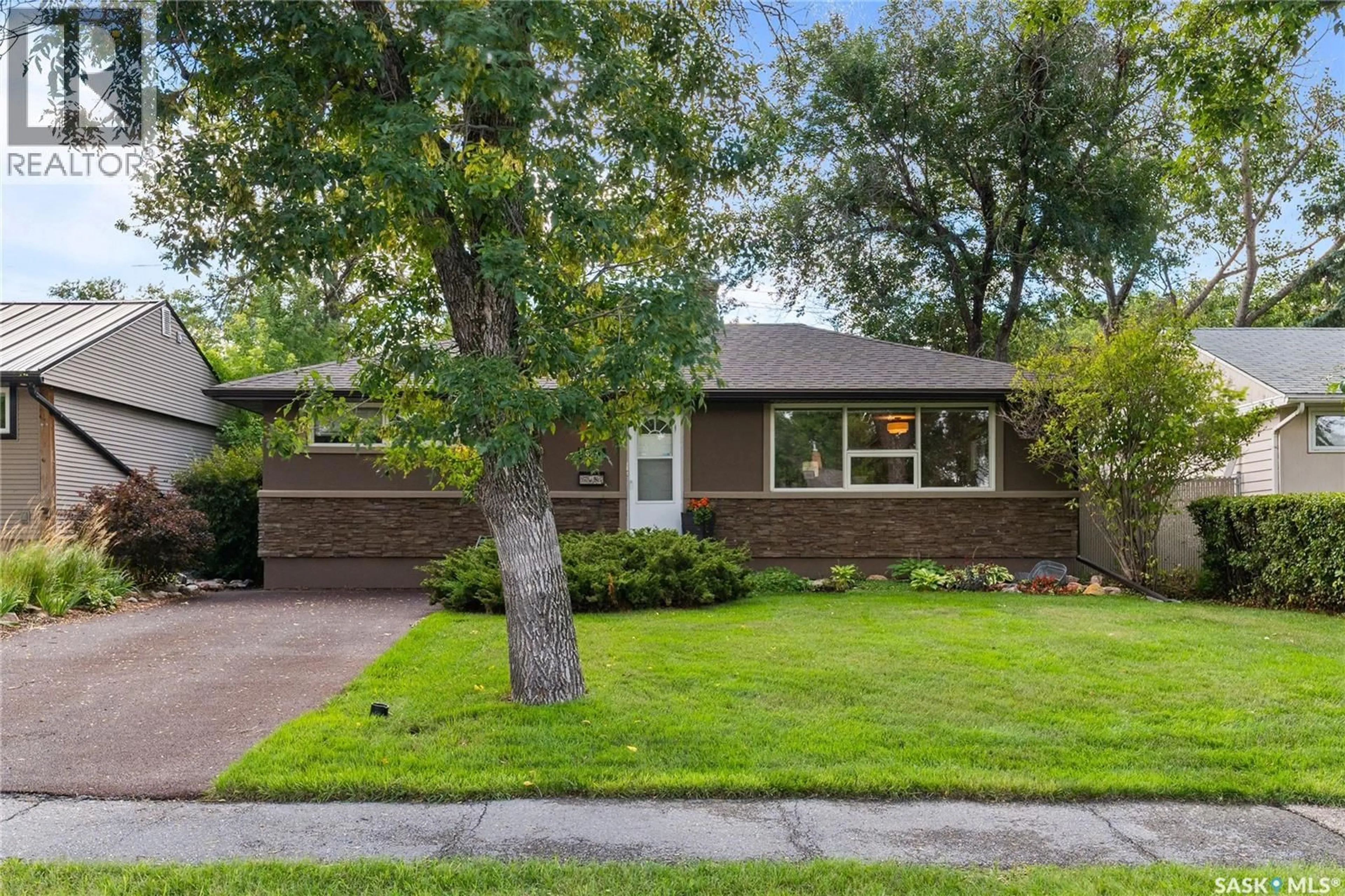 Home with brick exterior material, street for 609 18TH AVENUE, Regina Saskatchewan S4N1E6
