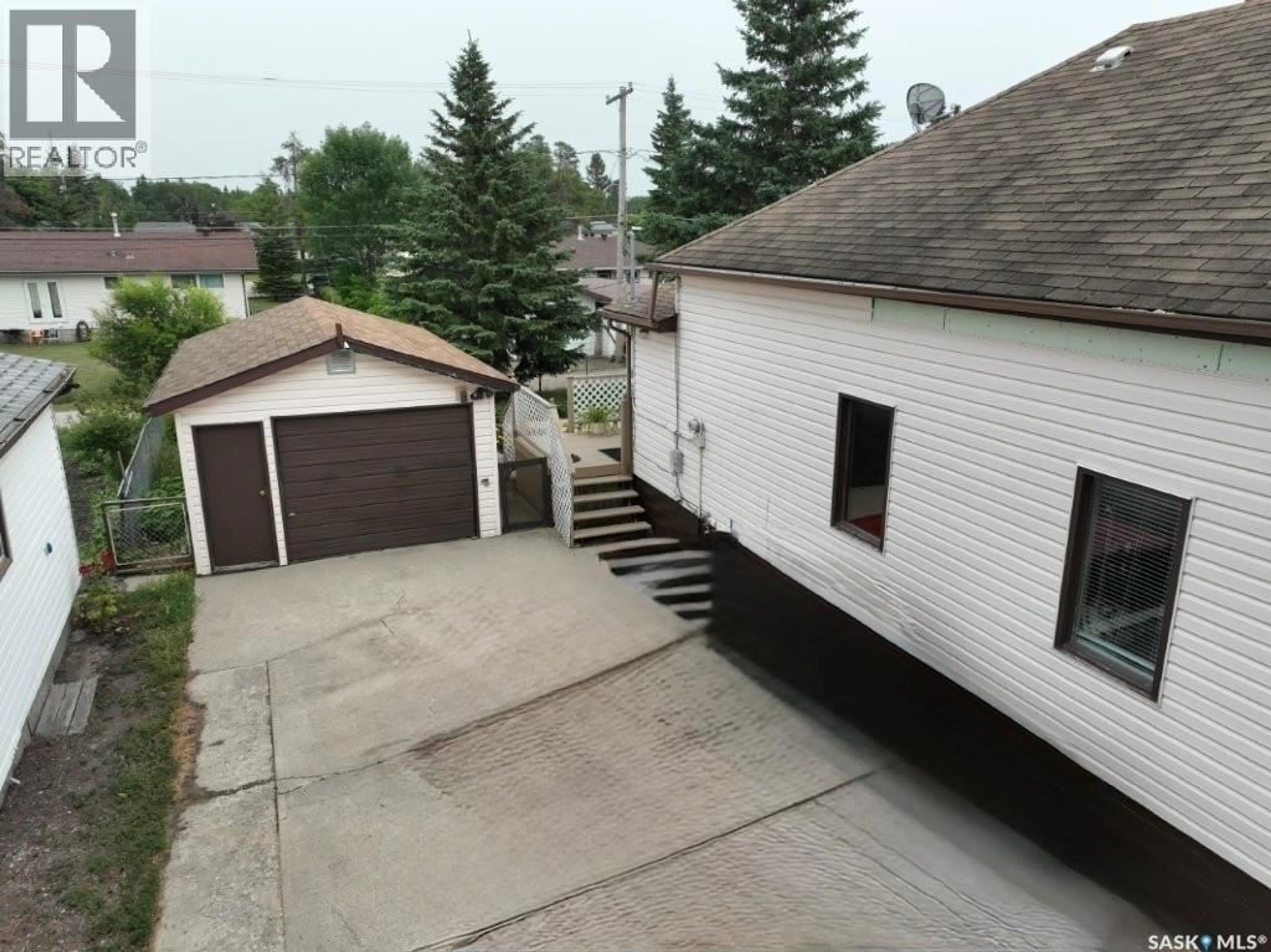 A pic from outside/outdoor area/front of a property/back of a property/a pic from drone, street for 710 PRINCE STREET, Hudson Bay Saskatchewan S0E0Y0