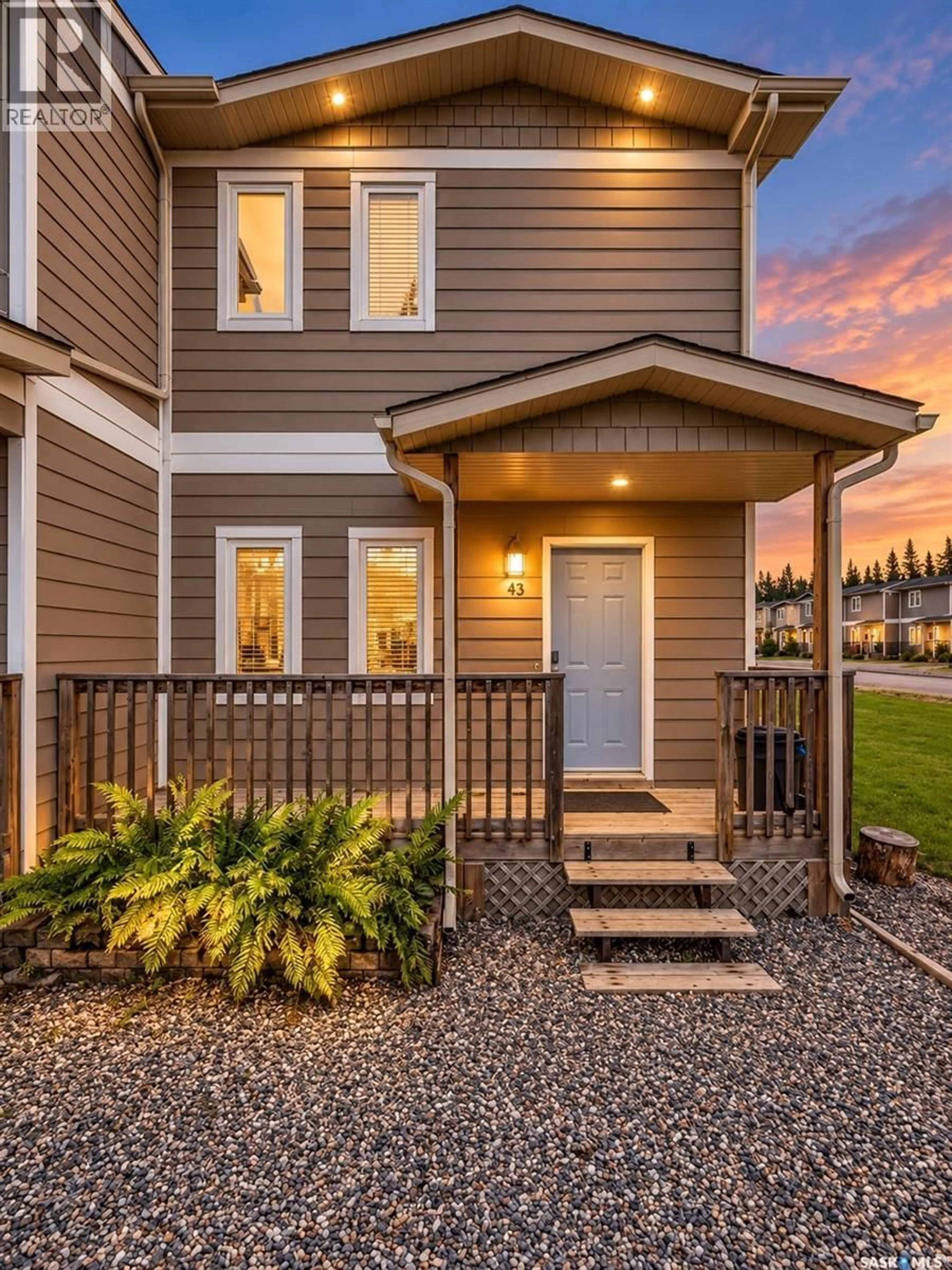 Home with vinyl exterior material, street for 43 RUMBERGER ROAD, Candle Lake Saskatchewan S0J3E0