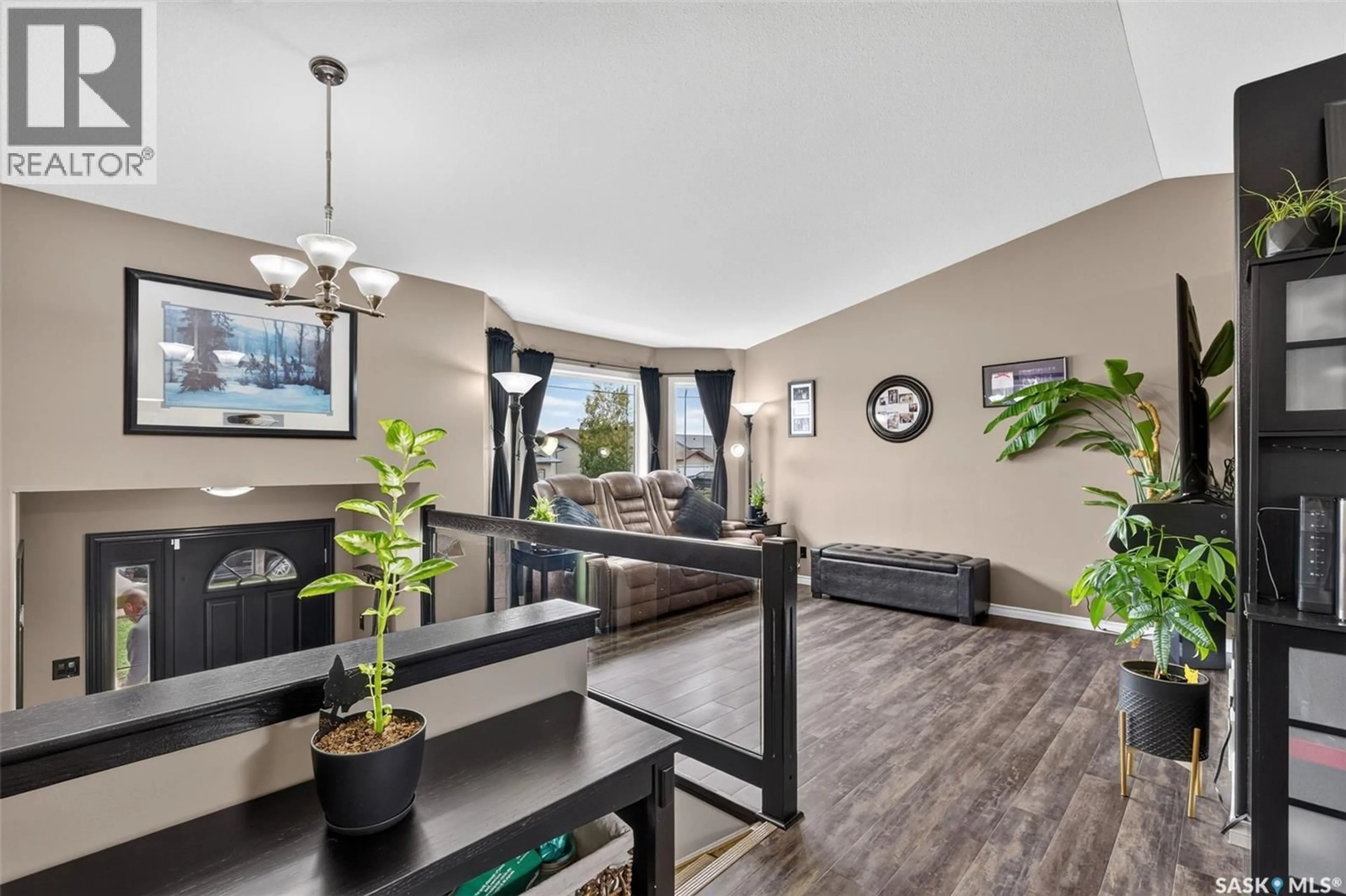 Open concept kitchen, wood/laminate floor for 3 KELLY PLACE, Prince Albert Saskatchewan S6V8E8