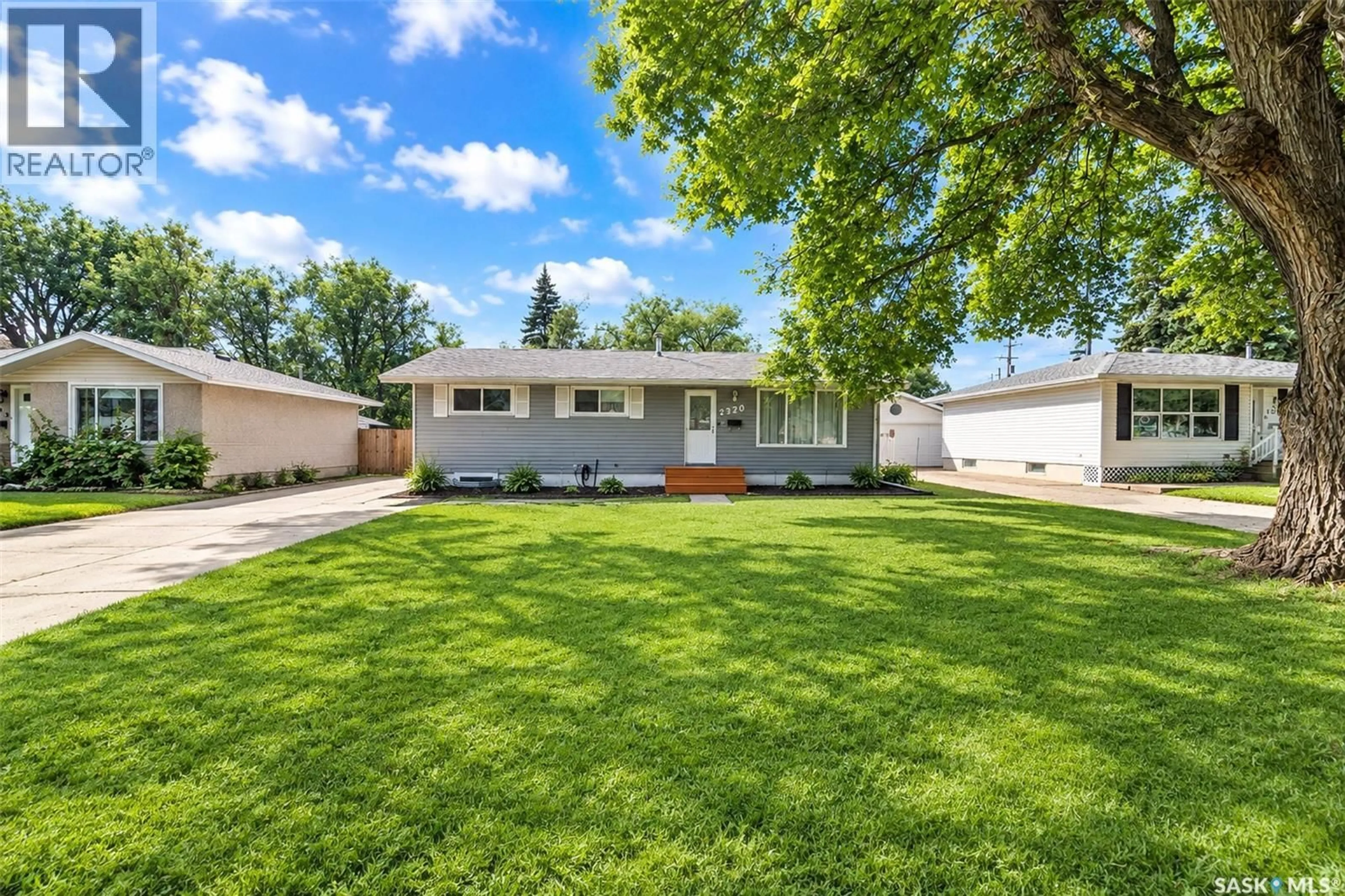 Home with vinyl exterior material, street for 2320 PRESTON AVENUE, Saskatoon Saskatchewan S7J2E9