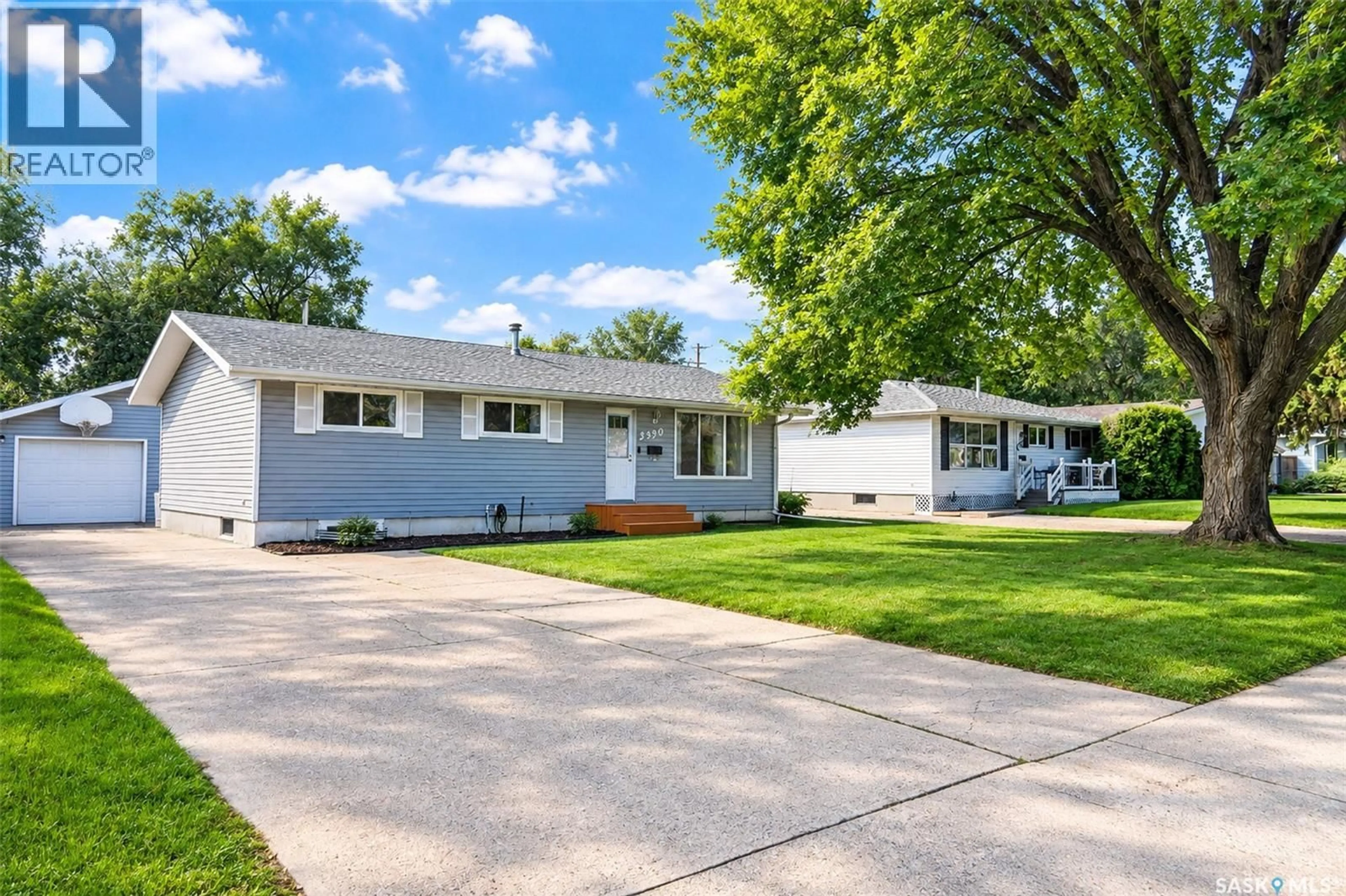 Home with vinyl exterior material, street for 2320 PRESTON AVENUE, Saskatoon Saskatchewan S7J2E9