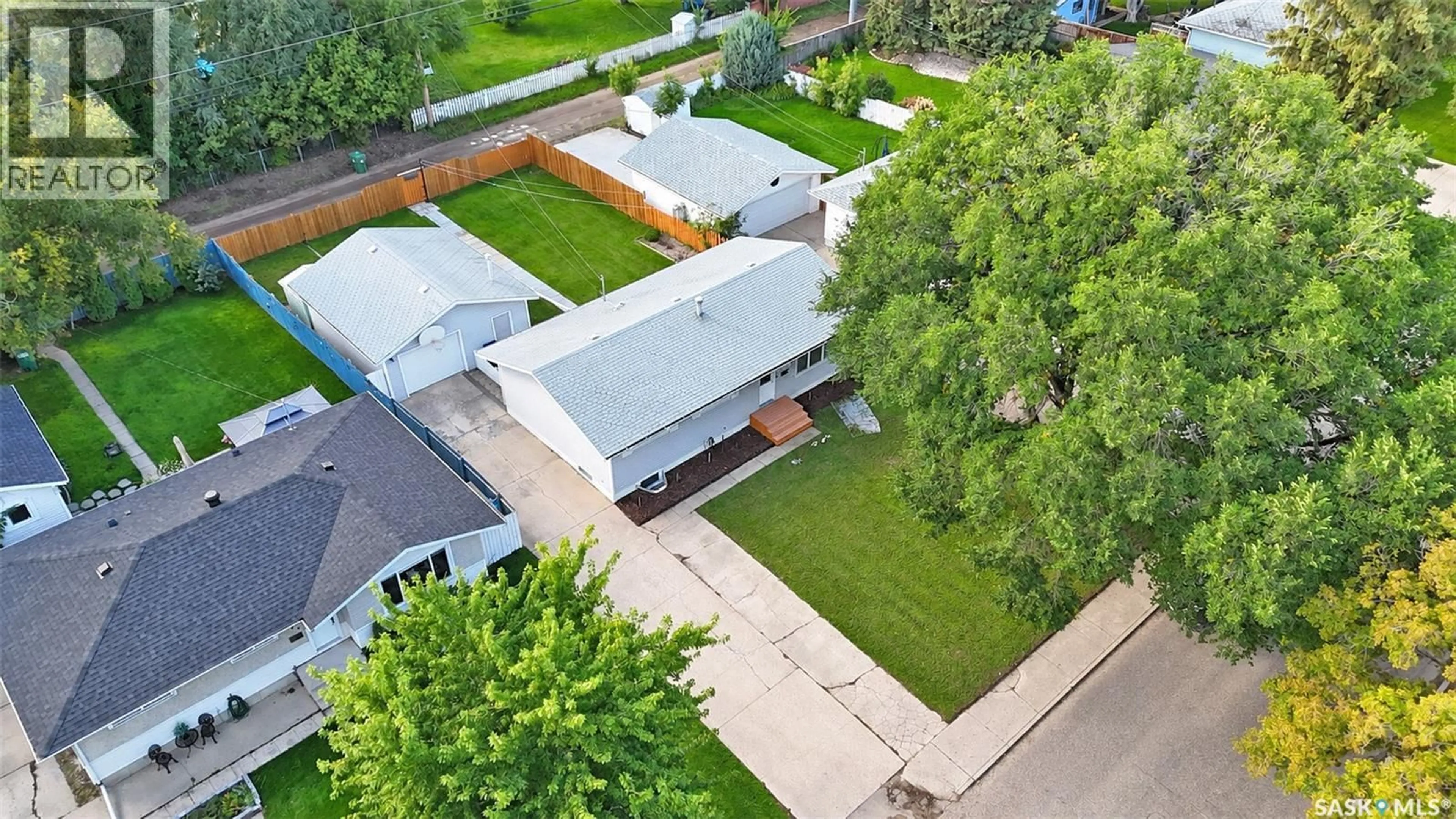 A pic from outside/outdoor area/front of a property/back of a property/a pic from drone, street for 2320 PRESTON AVENUE, Saskatoon Saskatchewan S7J2E9