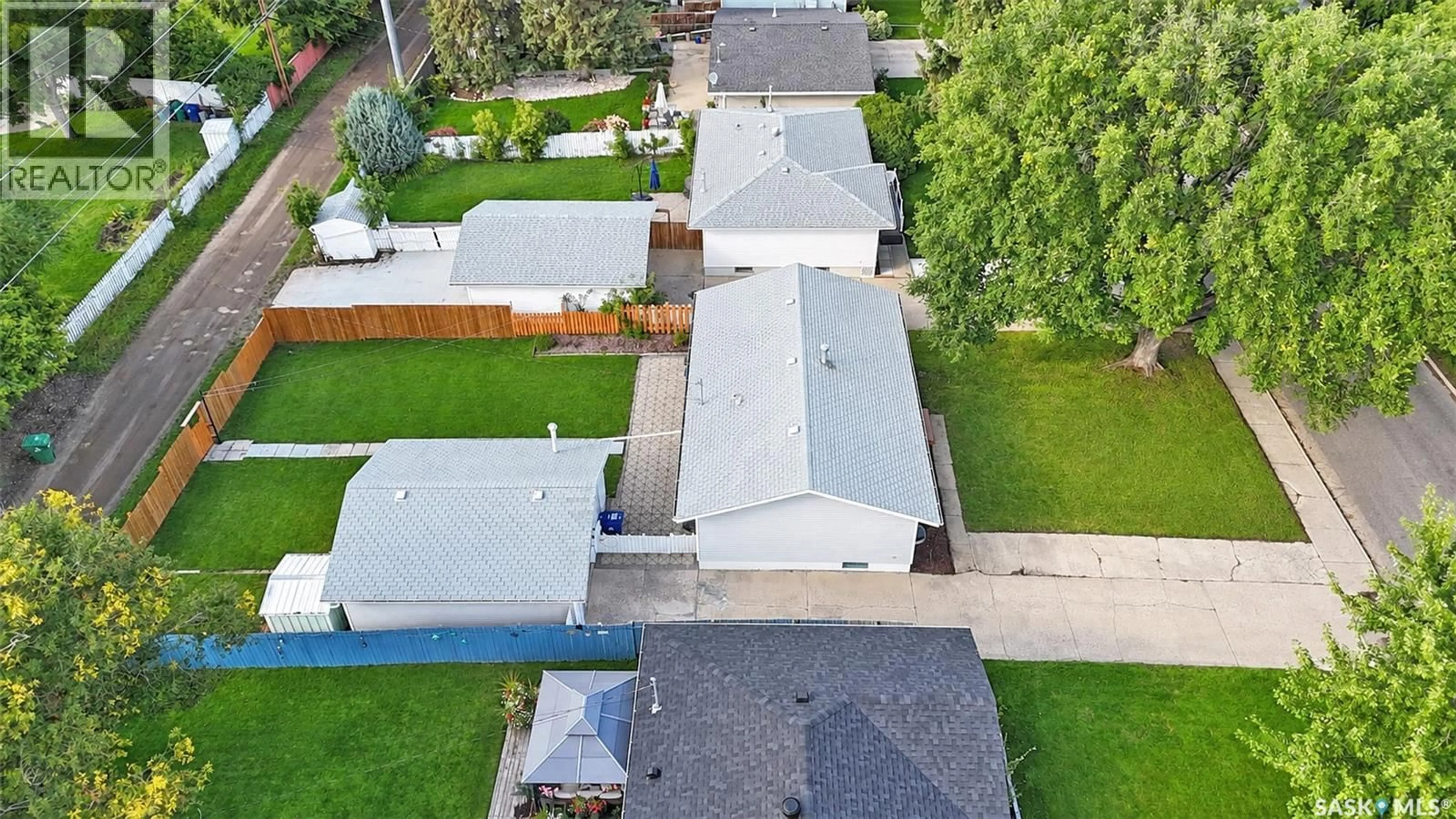 A pic from outside/outdoor area/front of a property/back of a property/a pic from drone, street for 2320 PRESTON AVENUE, Saskatoon Saskatchewan S7J2E9