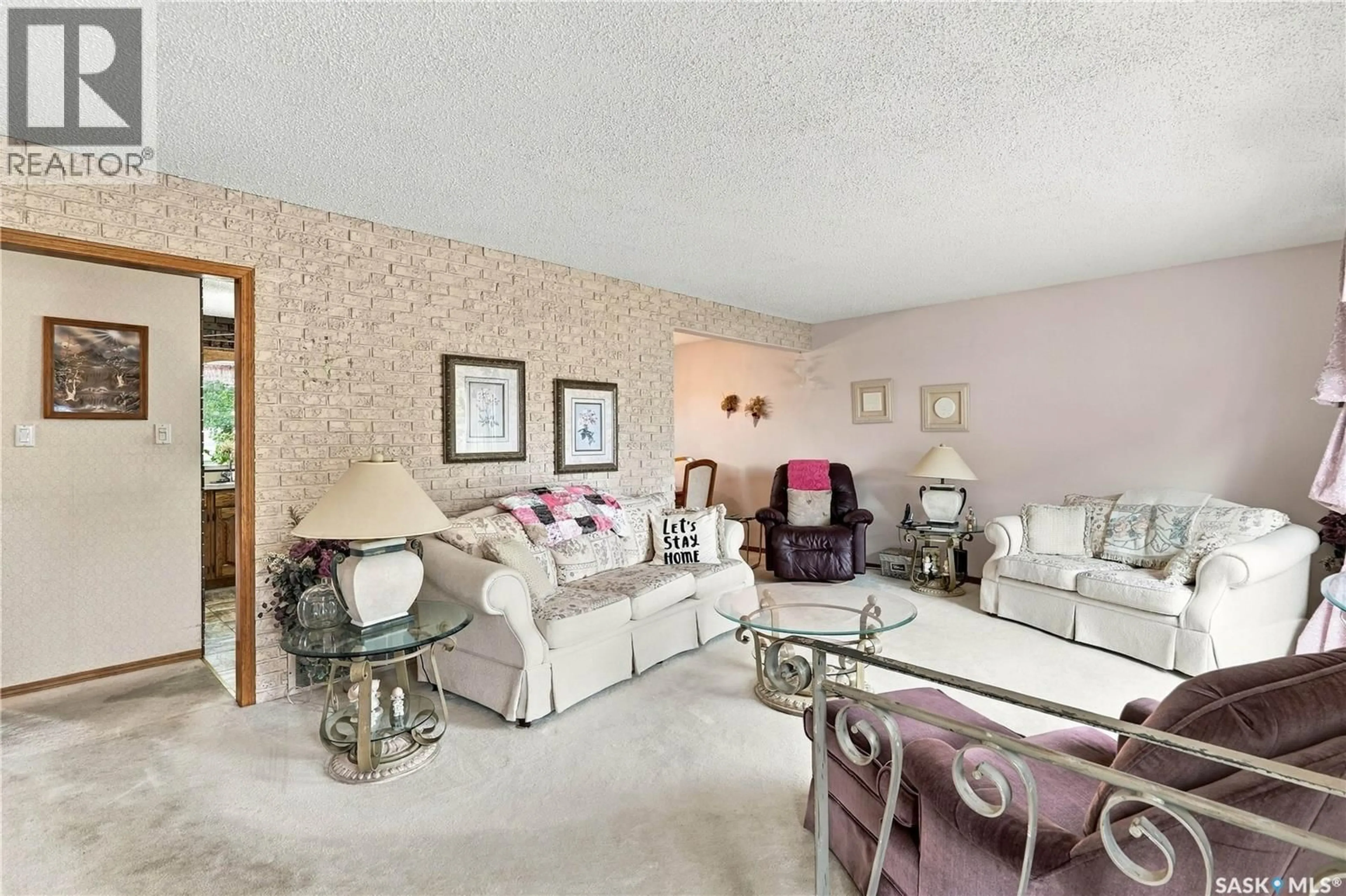 Living room with furniture, unknown for 1015 SIMCOE STREET, Moose Jaw Saskatchewan S6H3J3