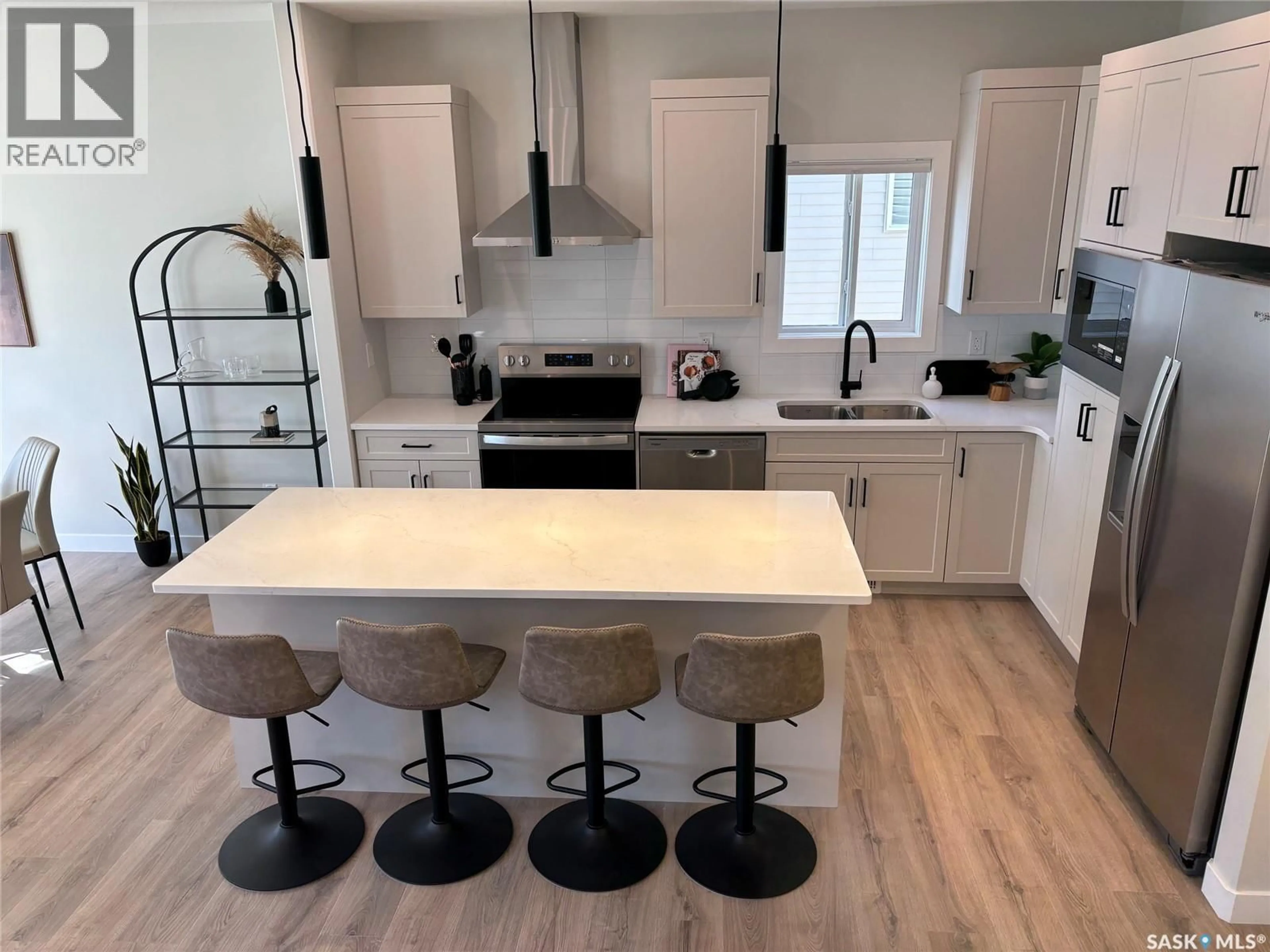 Open concept kitchen, unknown for 242 ASOKANIHKEW CRESCENT, Saskatoon Saskatchewan S7V2C4
