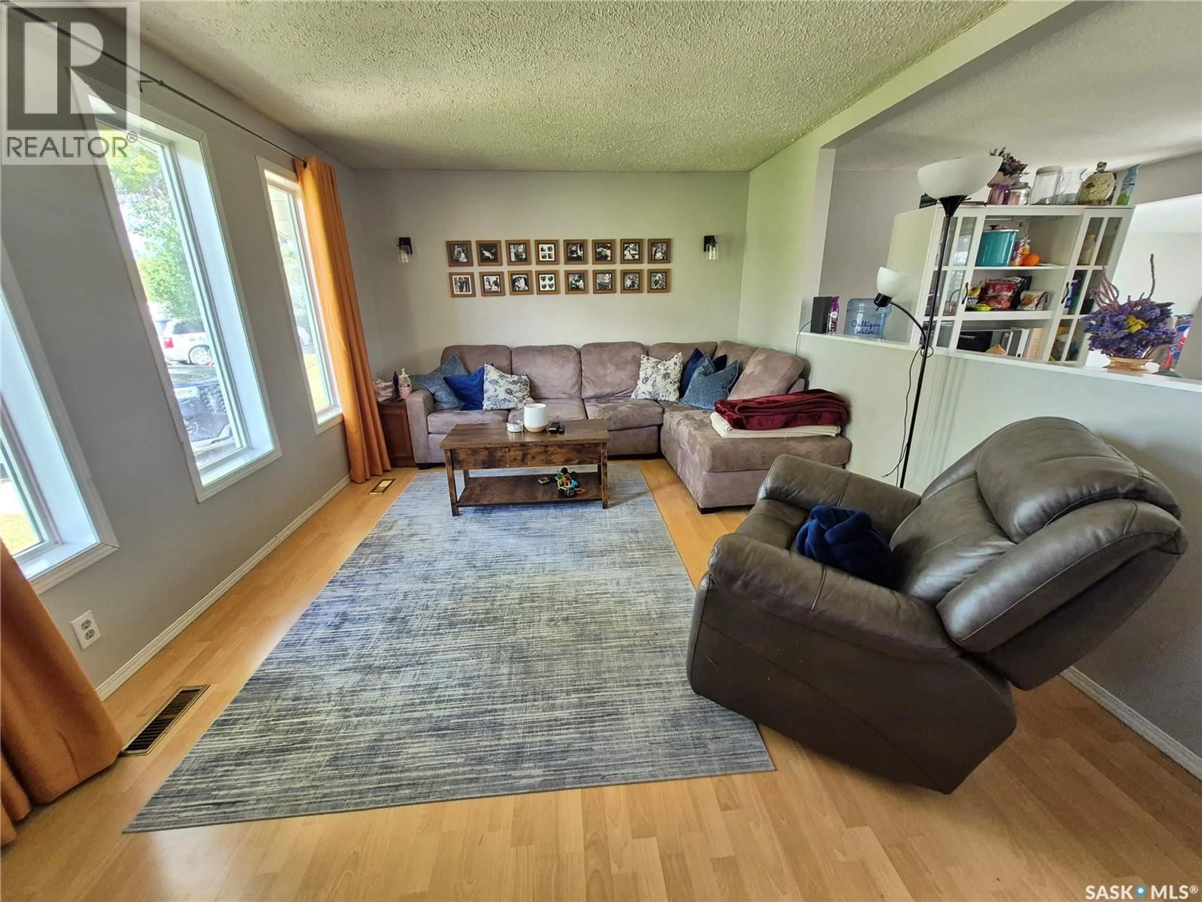 Living room with furniture, unknown for 32 METHERAL BAY, Weyburn Saskatchewan S4H2M6