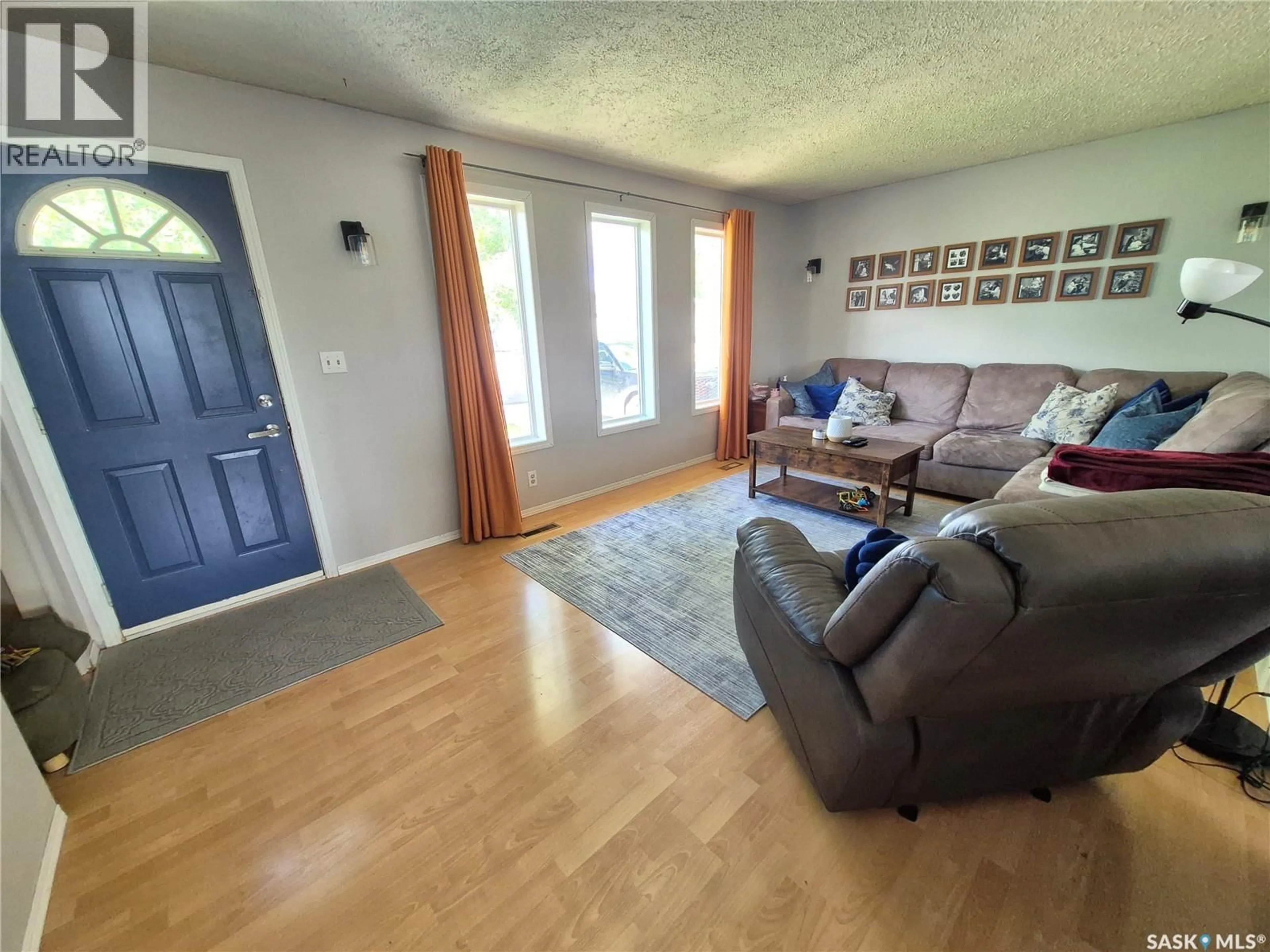 Living room with furniture, unknown for 32 METHERAL BAY, Weyburn Saskatchewan S4H2M6