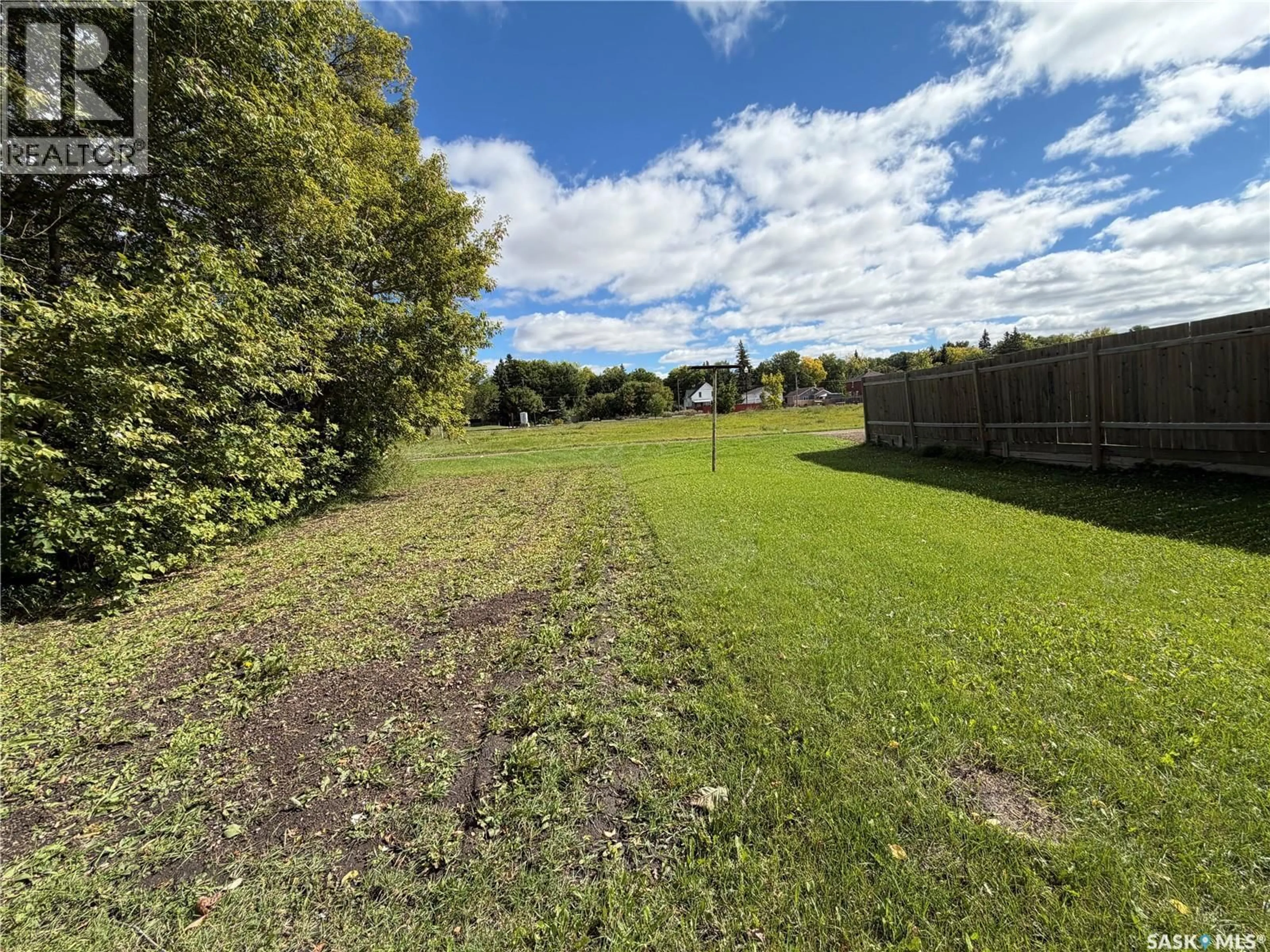 A pic from outside/outdoor area/front of a property/back of a property/a pic from drone, forest/trees view for 31 LAURIER AVENUE, Yorkton Saskatchewan S3N1T7