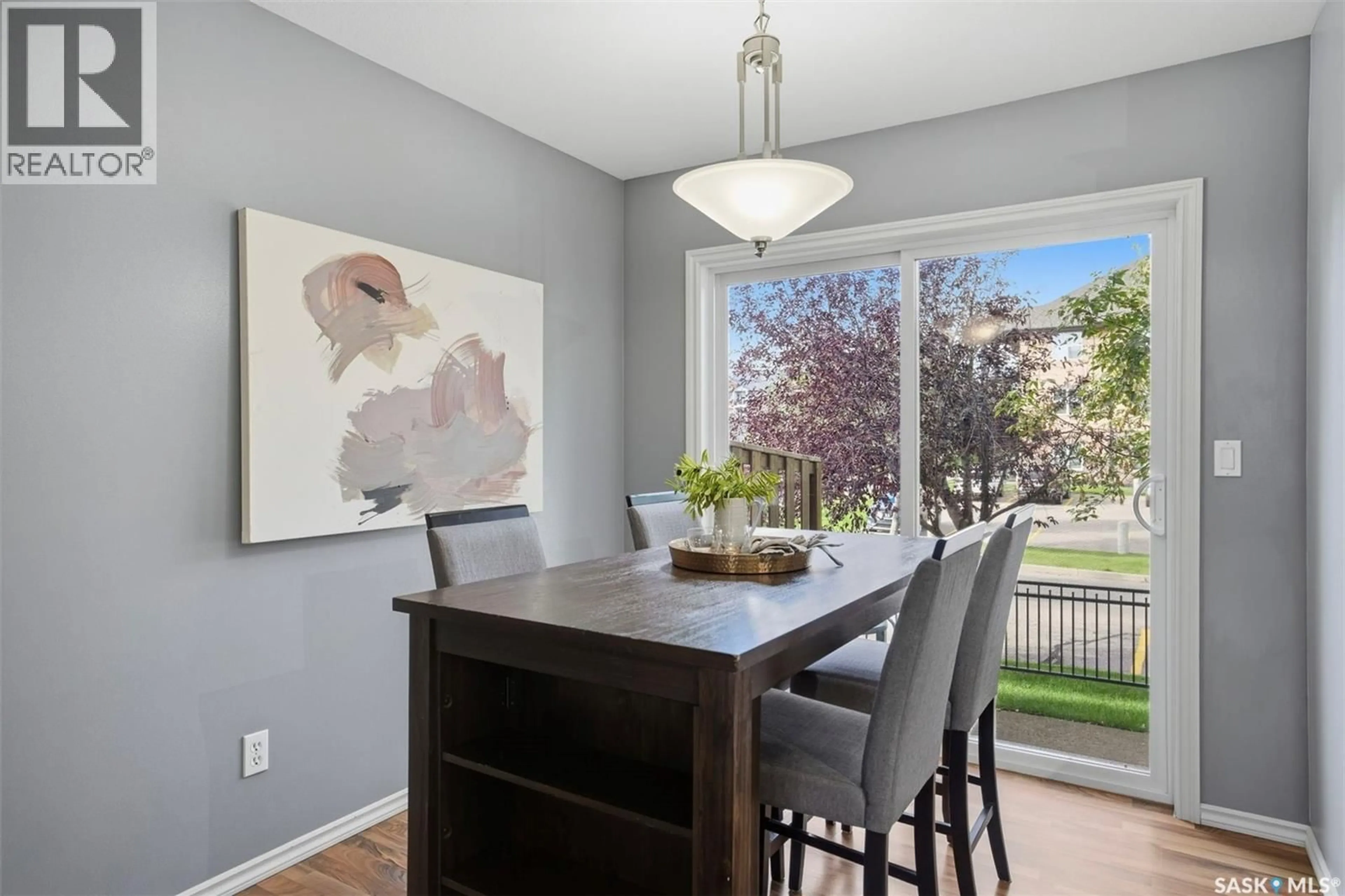 Dining room, wood/laminate floor for 415 - 108 LYND CRESCENT, Saskatoon Saskatchewan S7T0C2