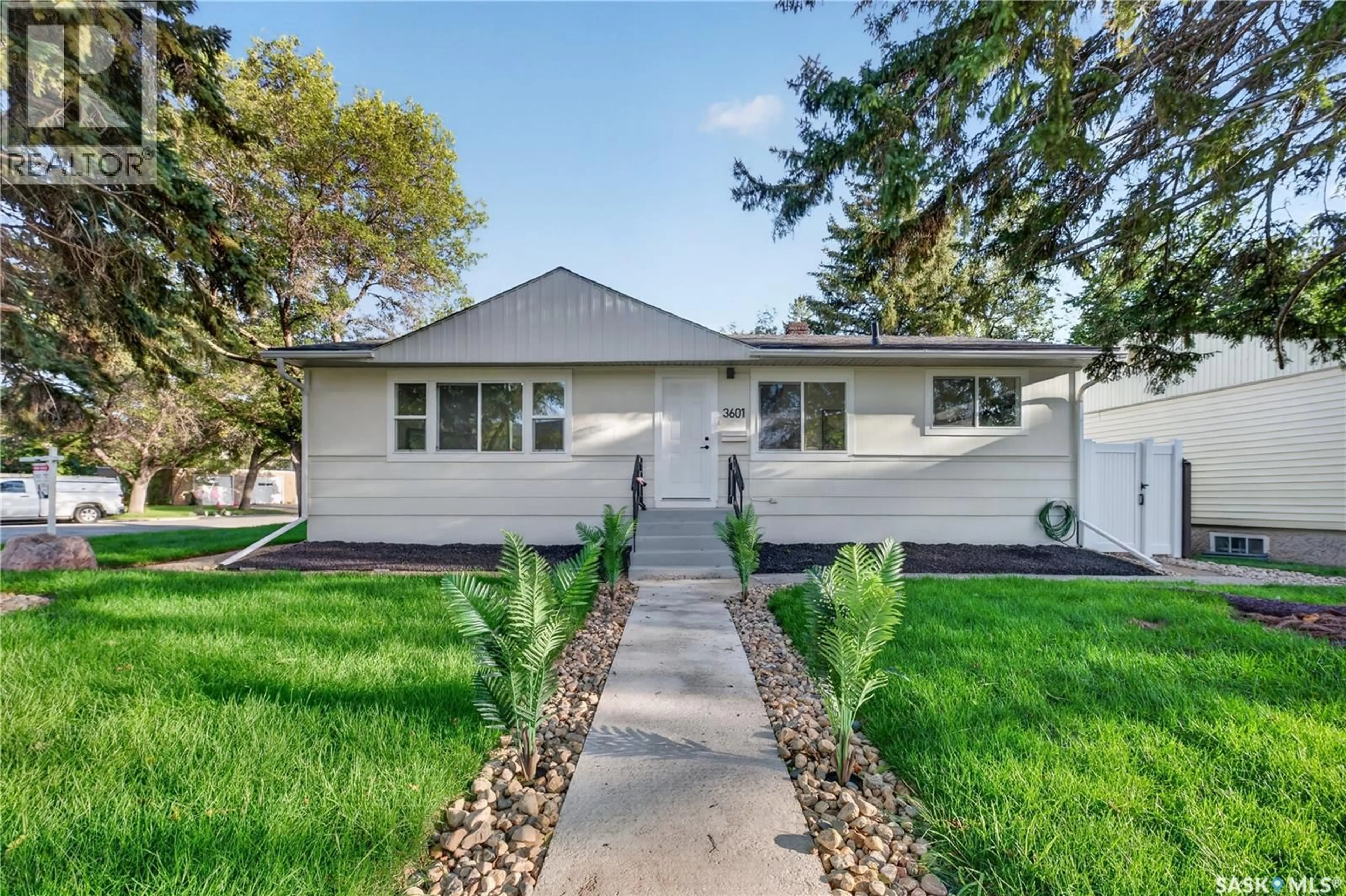 Home with vinyl exterior material, street for 3601 21ST AVENUE, Regina Saskatchewan S4S0V3