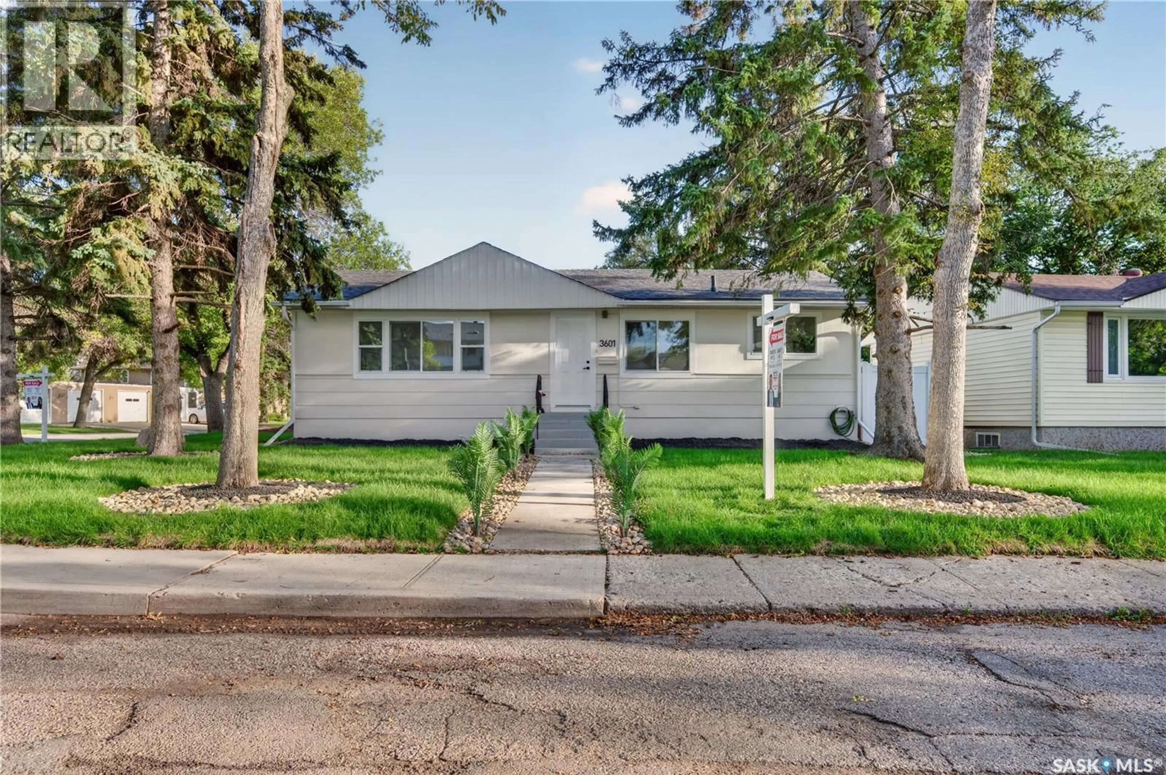 Home with vinyl exterior material, street for 3601 21ST AVENUE, Regina Saskatchewan S4S0V3