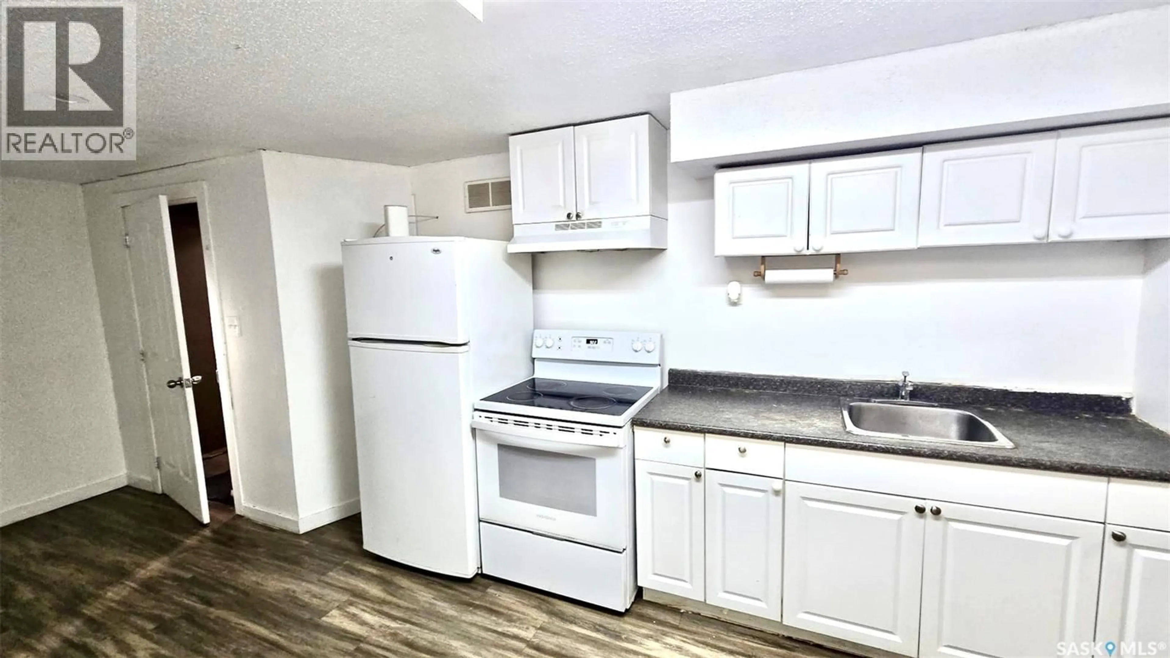 Standard kitchen, wood/laminate floor for 19 O'NEIL CRESCENT, Saskatoon Saskatchewan S7N1W7