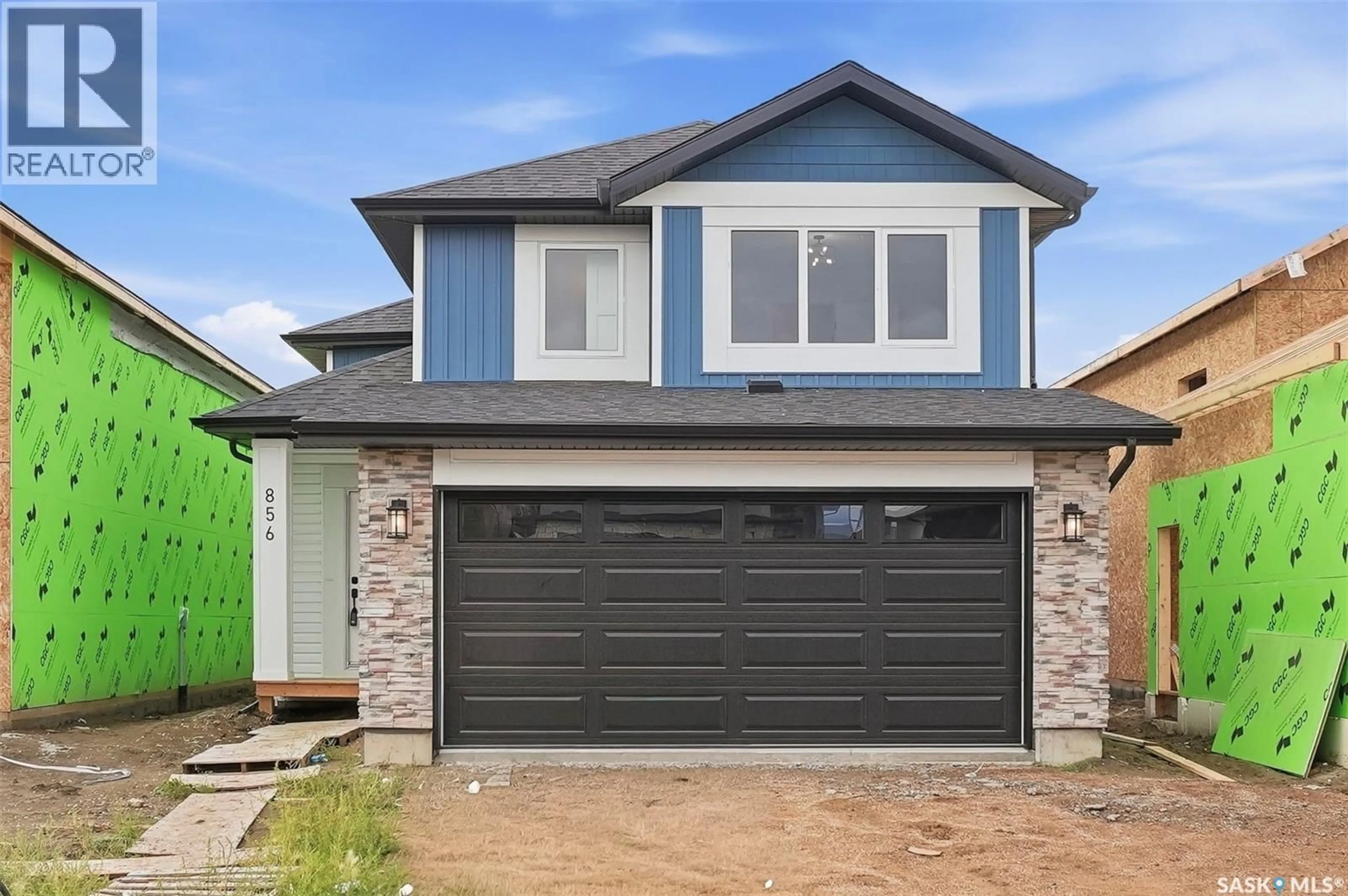 Home with vinyl exterior material, street for 856 NIGHTINGALE ROAD, Saskatoon Saskatchewan S7L7R5