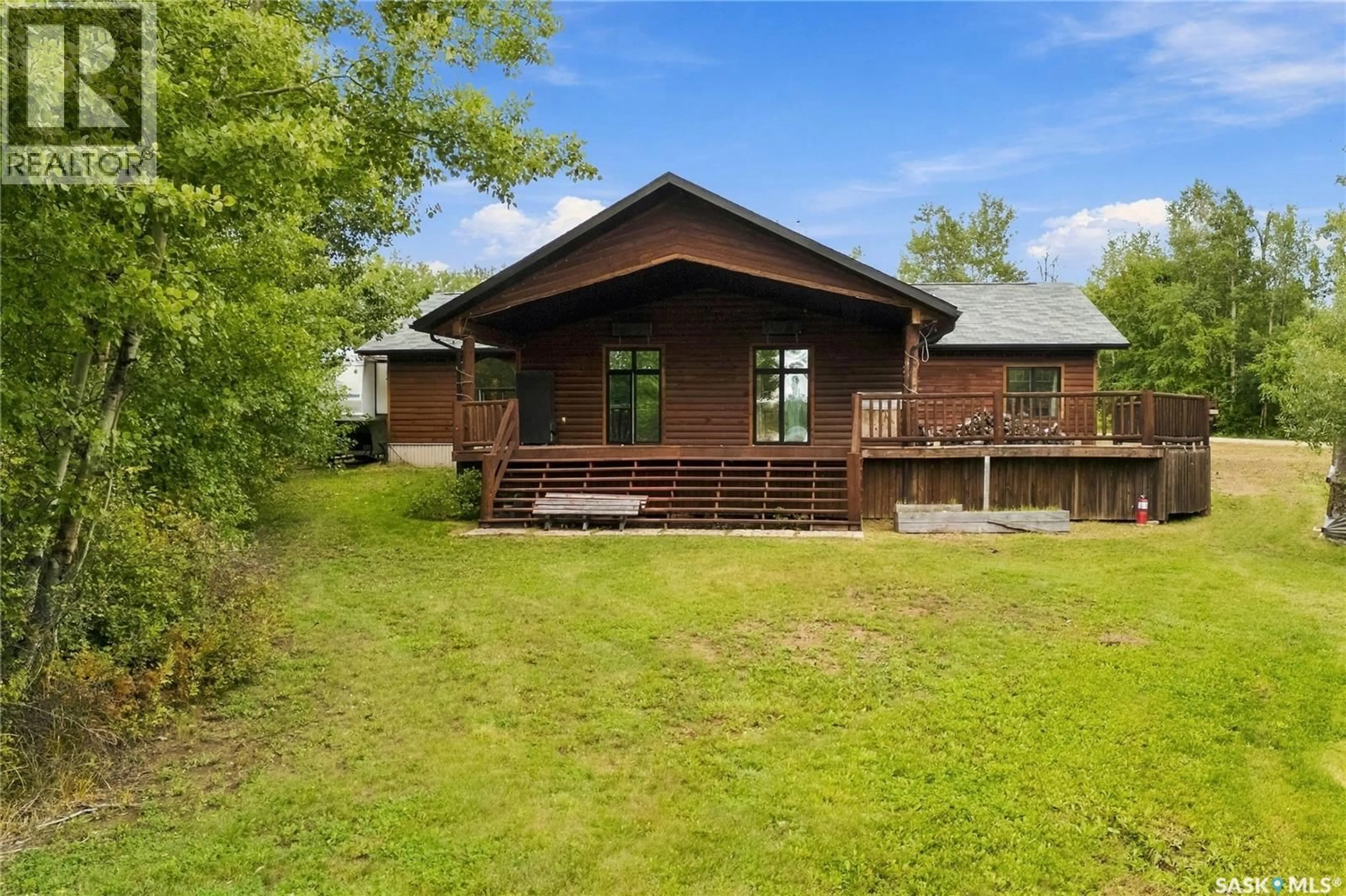 A pic from outside/outdoor area/front of a property/back of a property/a pic from drone, unknown for 214 ASPEN TRAIL, Chante Lake Saskatchewan S0K1J0