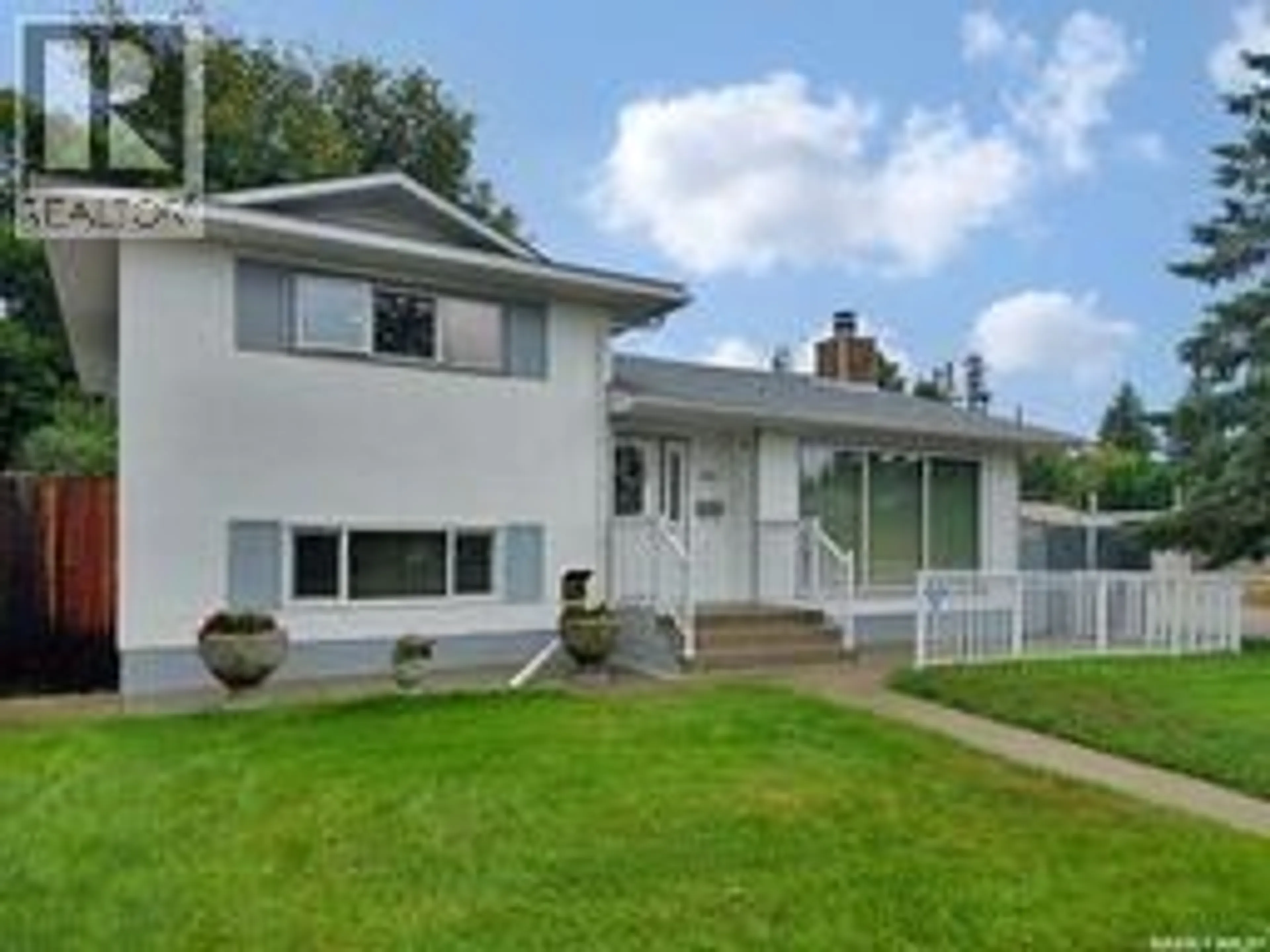Home with vinyl exterior material, street for 2429 CUMBERLAND AVENUE, Saskatoon Saskatchewan S7J1Z8