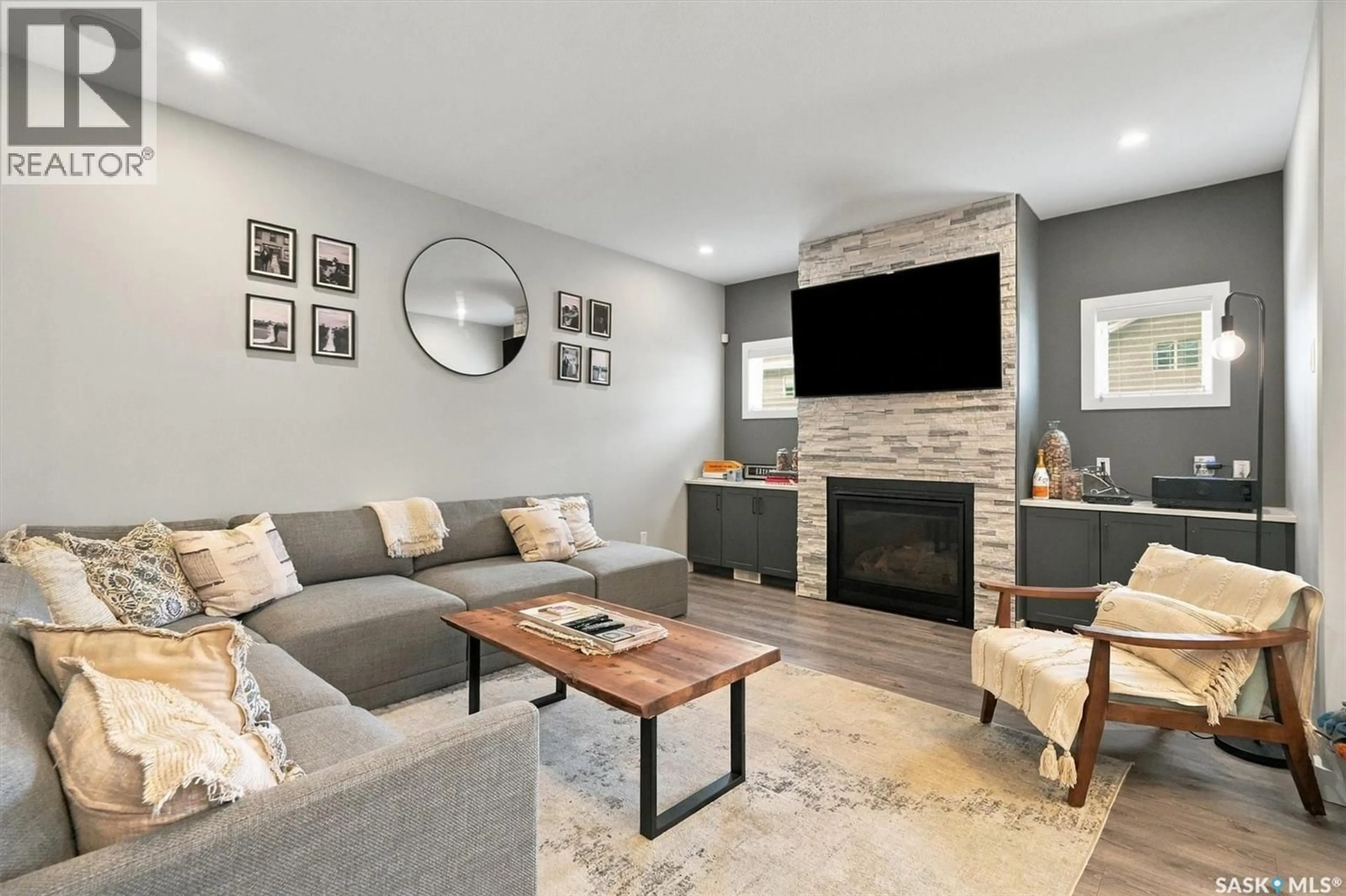 Living room with furniture, unknown for 311 DAGNONE CRESCENT, Saskatoon Saskatchewan S7V0P7