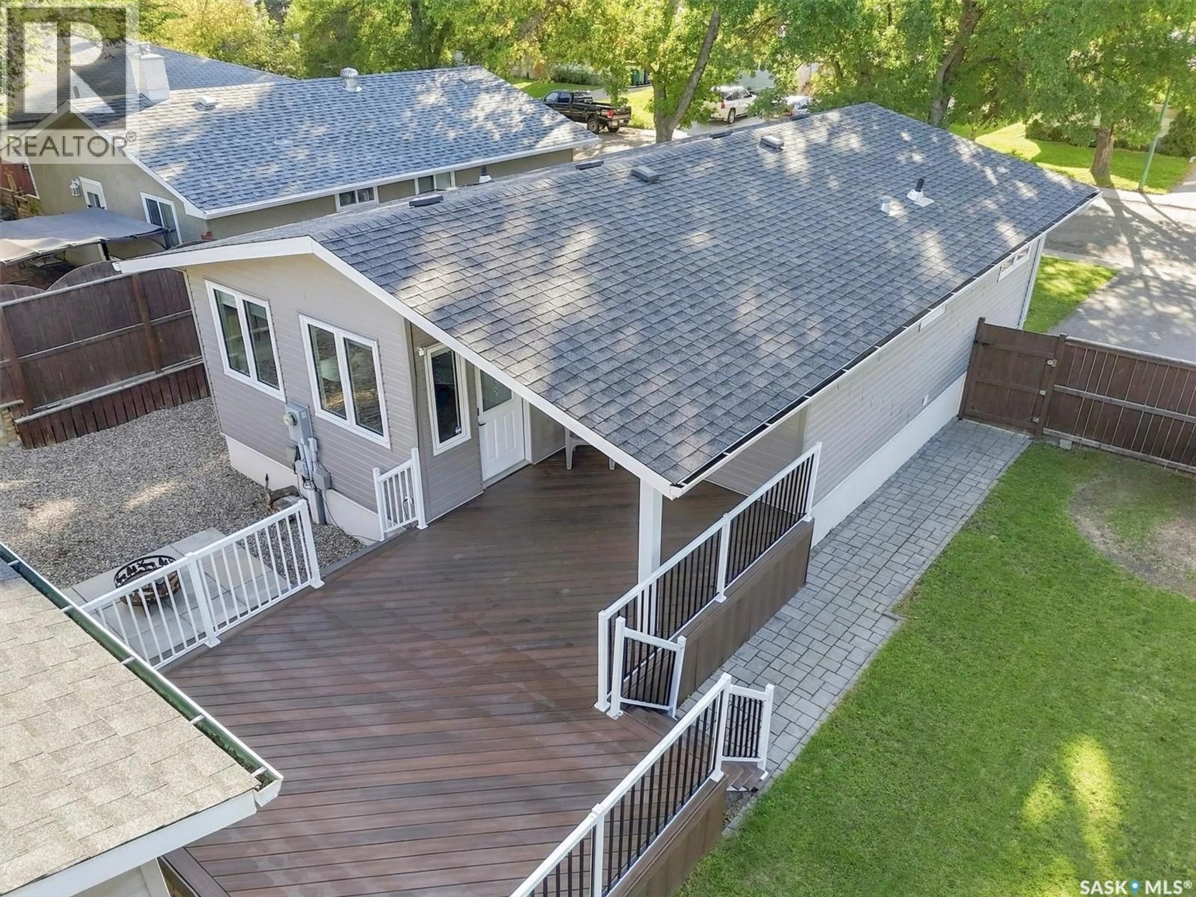 A pic from outside/outdoor area/front of a property/back of a property/a pic from drone, street for 134 ROSS CRESCENT, Saskatoon Saskatchewan S7L4B3