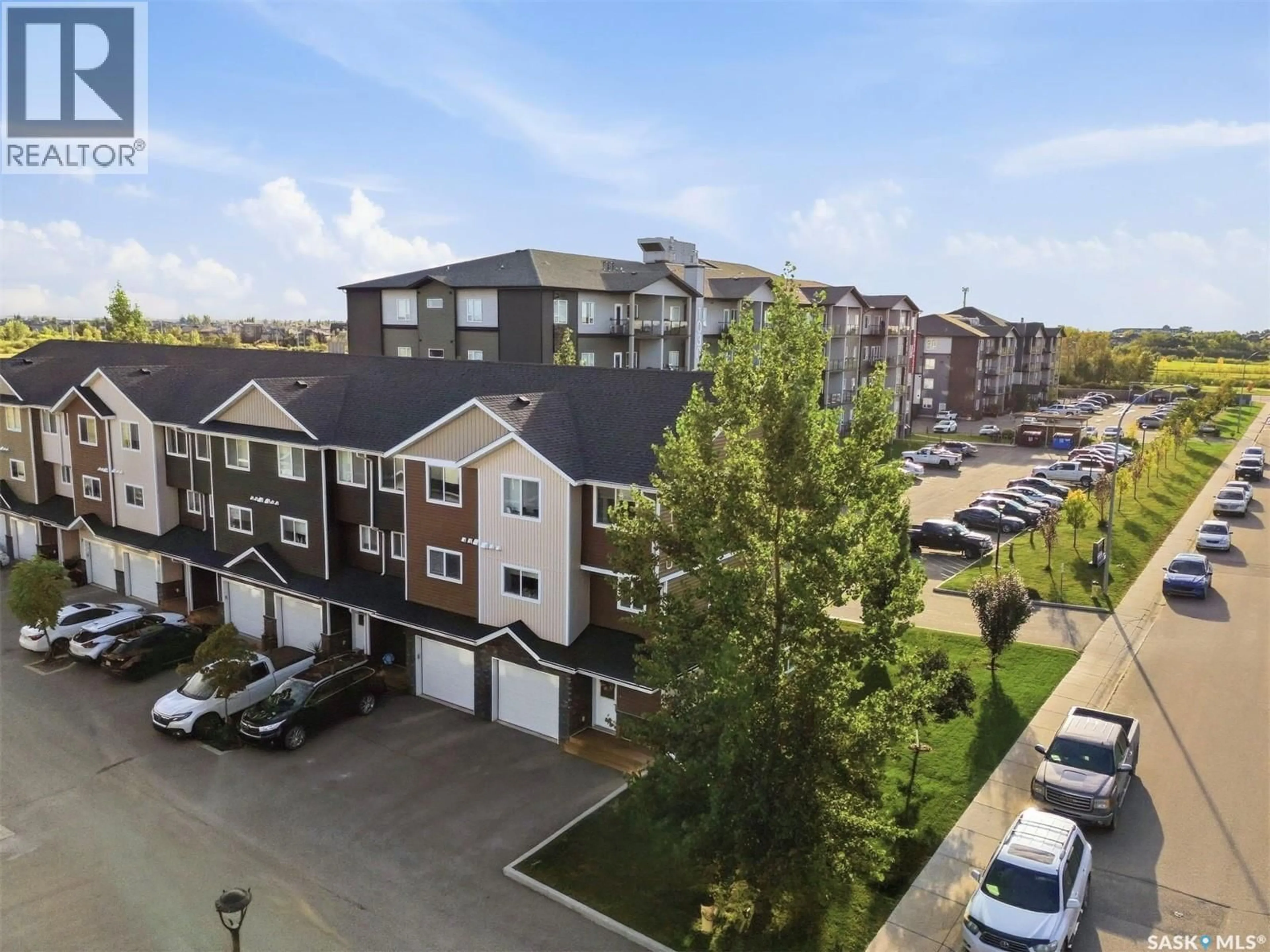 A pic from outside/outdoor area/front of a property/back of a property/a pic from drone, city buildings view from balcony for 1 - 1060 PARR HILL DRIVE, Martensville Saskatchewan S0K2T1