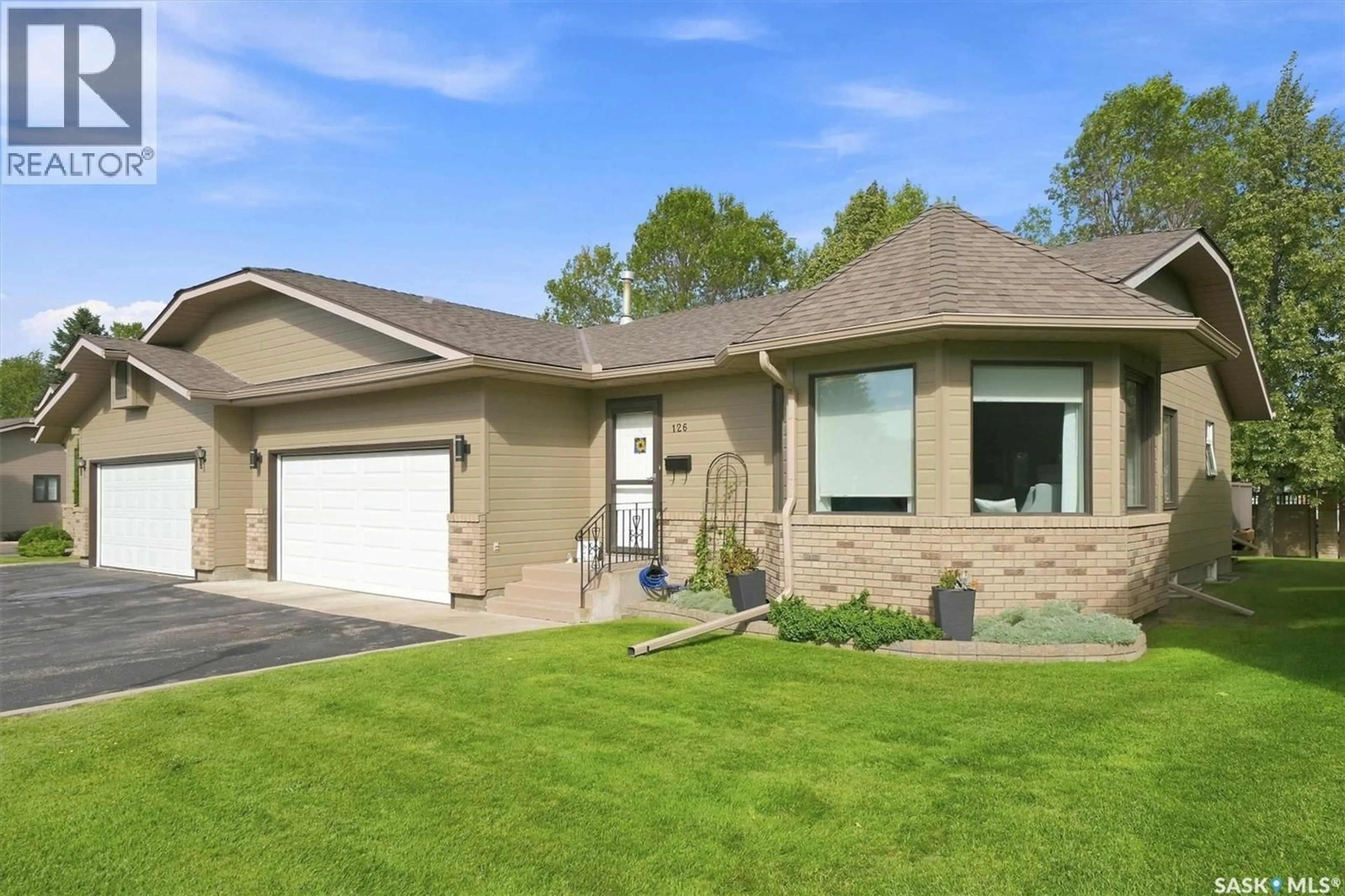 Home with brick exterior material, street for 420 - 126 HERITAGE CRESCENT, Saskatoon Saskatchewan S7H5P3