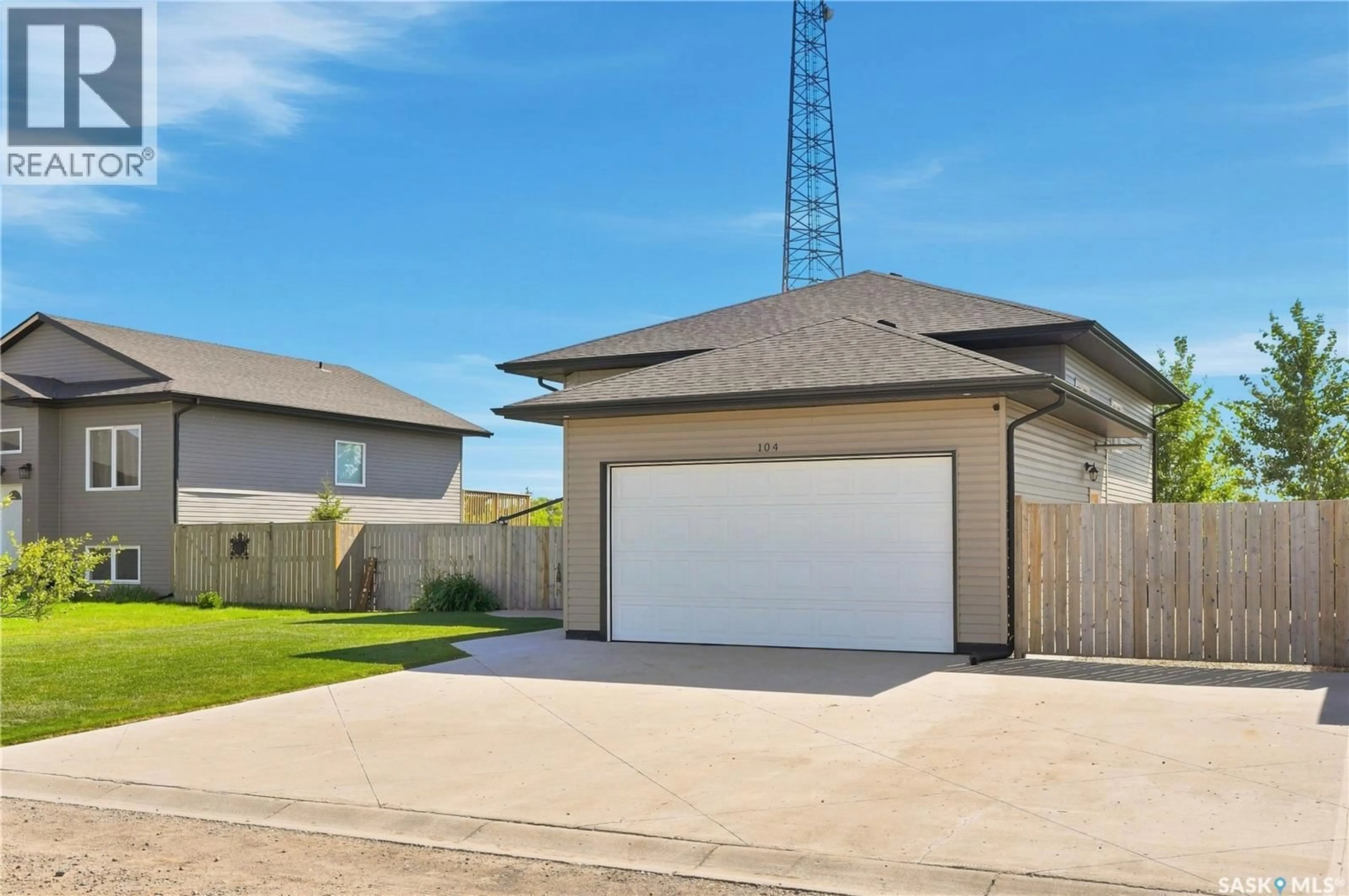 Home with vinyl exterior material, street for 104 MCDONALD STREET, Aberdeen Saskatchewan S0K0A2