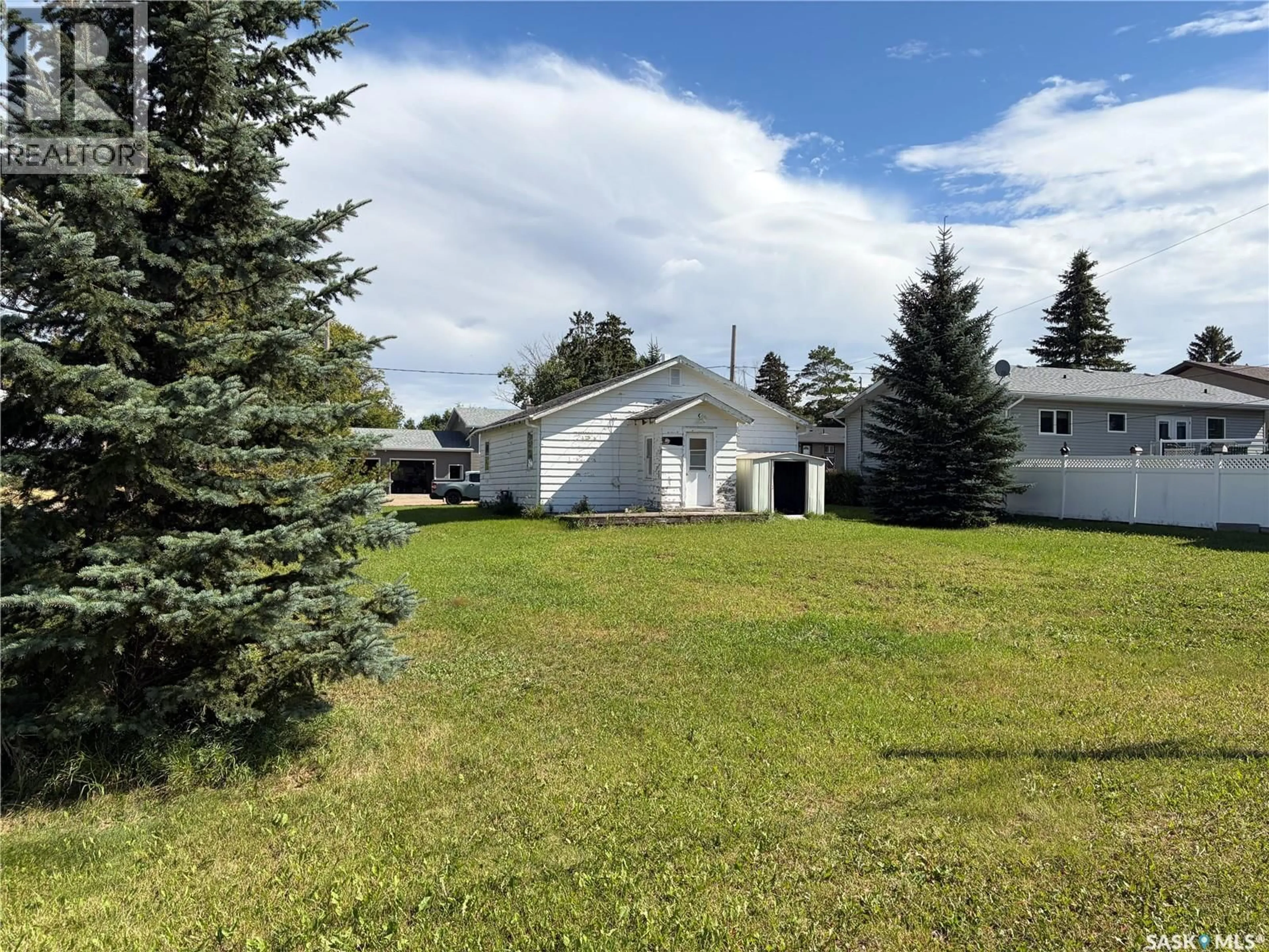 A pic from outside/outdoor area/front of a property/back of a property/a pic from drone, mountain view for 110 7TH AVENUE, Aberdeen Saskatchewan S0K0A0