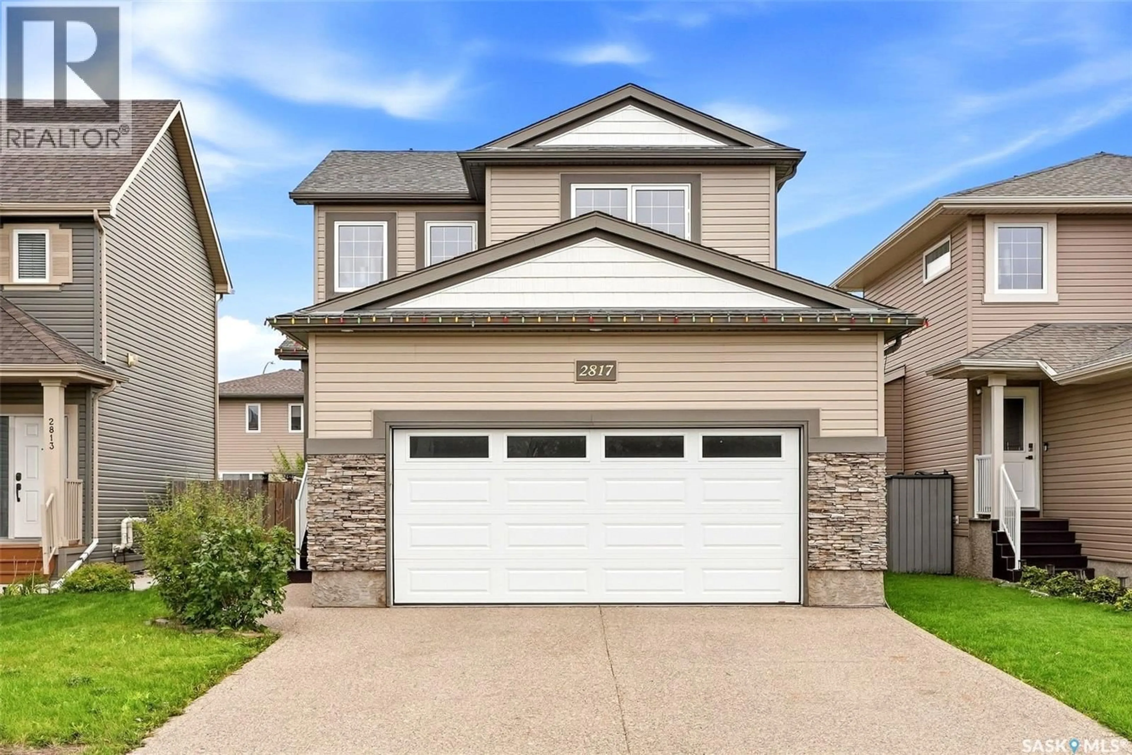 Home with vinyl exterior material, street for 2817 ELGAARD DRIVE, Regina Saskatchewan S4X0M4