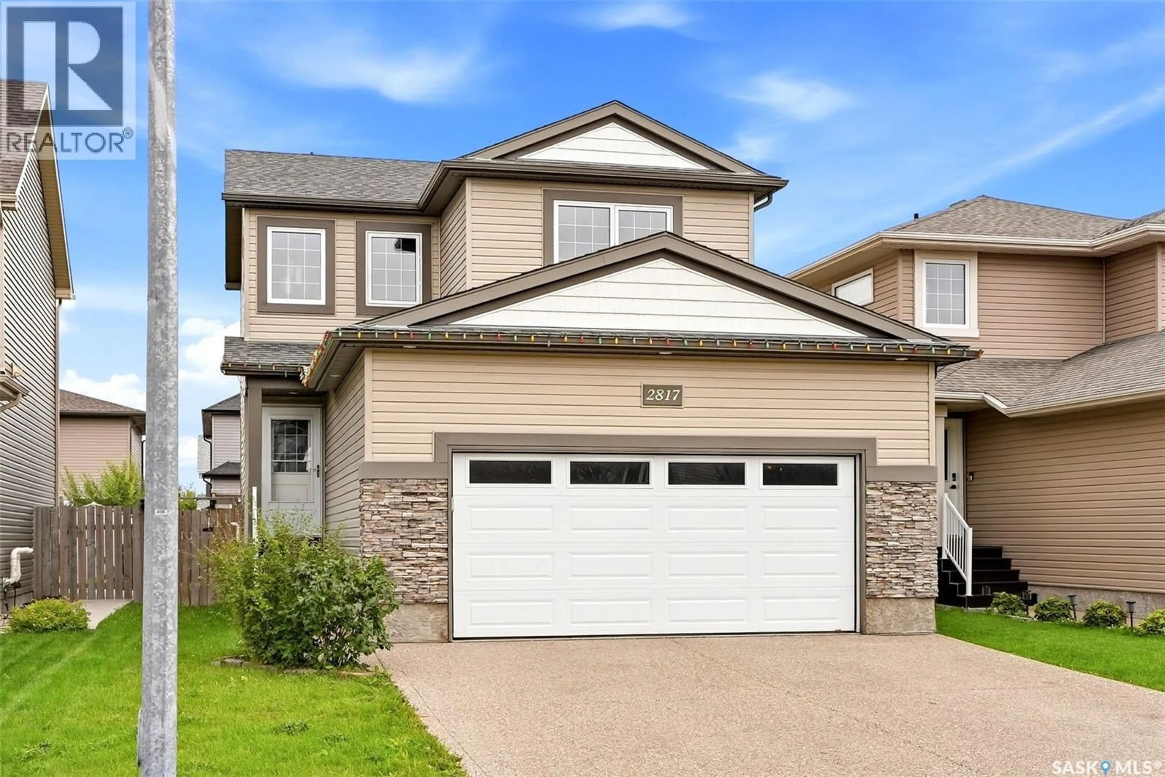 Home with vinyl exterior material, street for 2817 ELGAARD DRIVE, Regina Saskatchewan S4X0M4