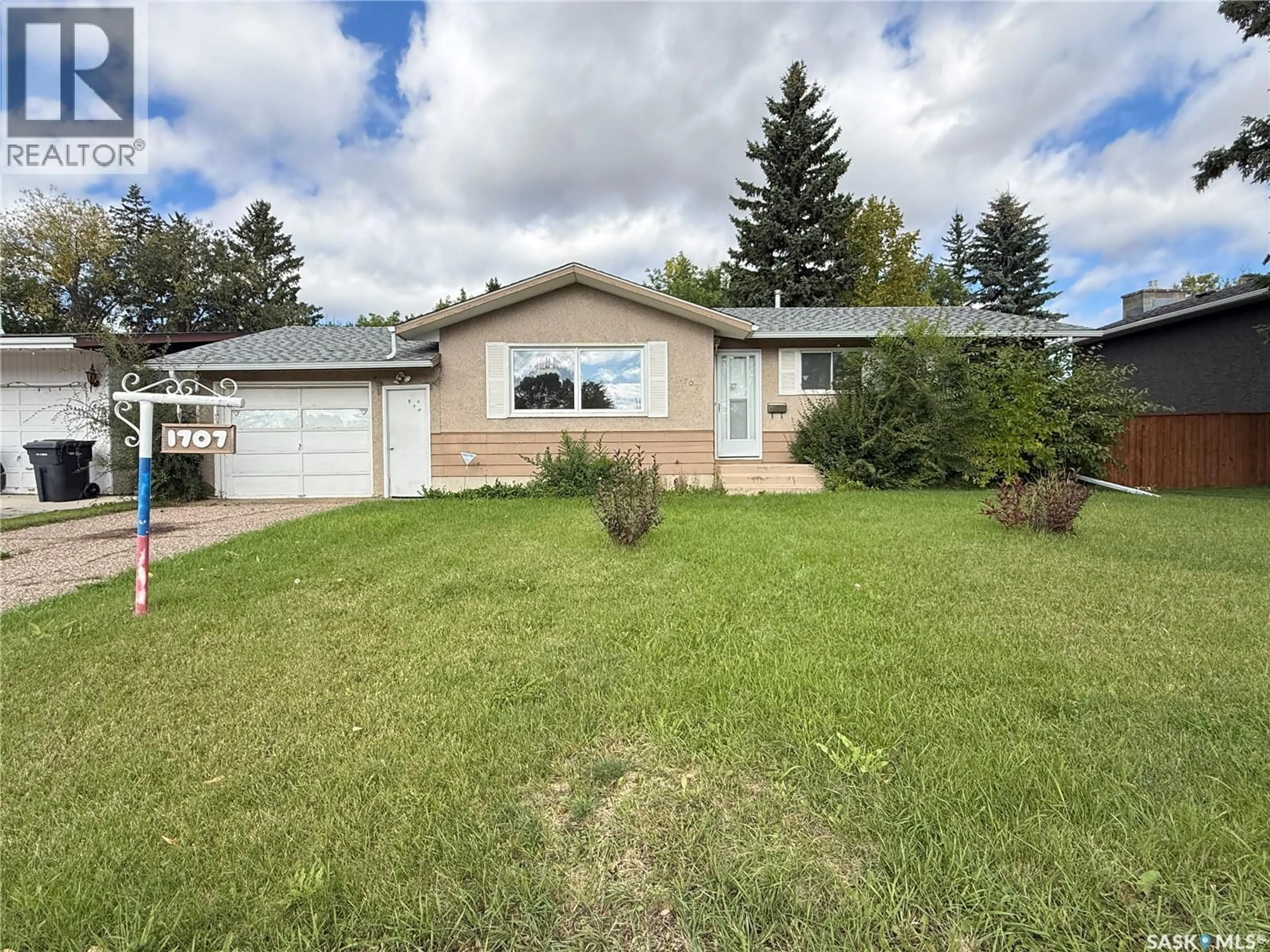 Home with vinyl exterior material, street for 1707 BOWERS DRIVE, North Battleford Saskatchewan S9A3A3