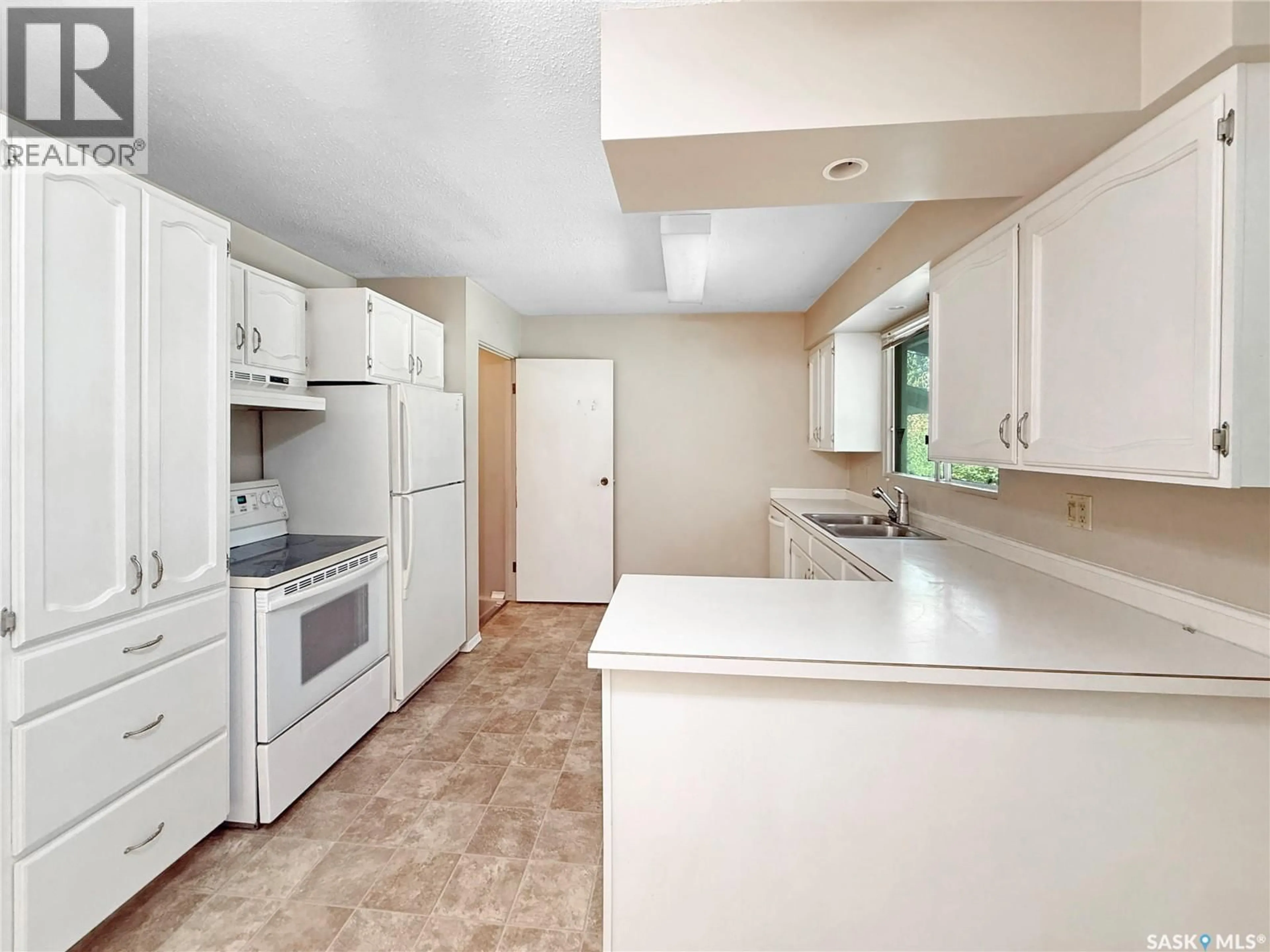 Standard kitchen, ceramic/tile floor for 1707 BOWERS DRIVE, North Battleford Saskatchewan S9A3A3