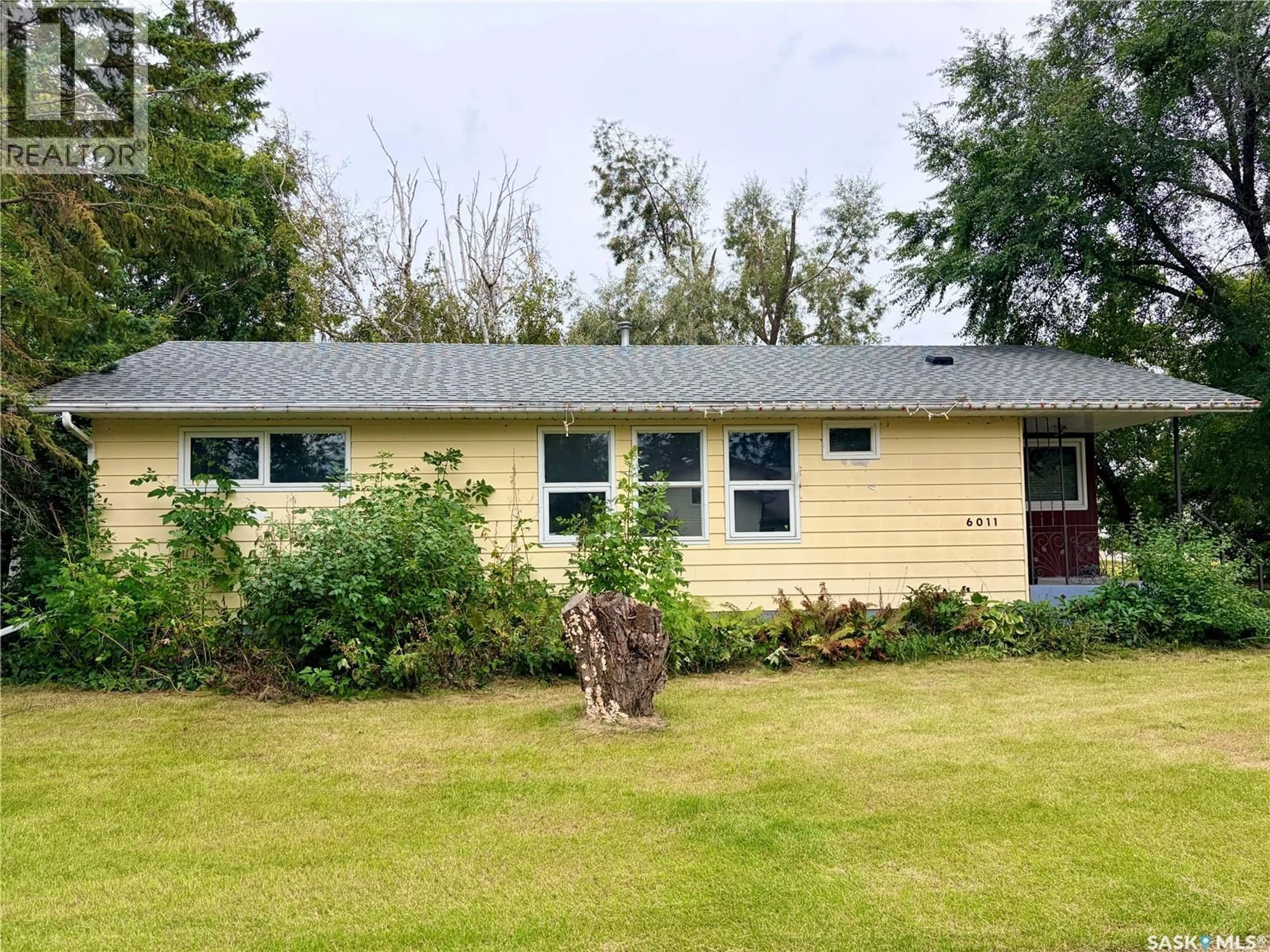 A pic from outside/outdoor area/front of a property/back of a property/a pic from drone, unknown for 6011 5TH STREET, Rosthern Saskatchewan S0K2H0