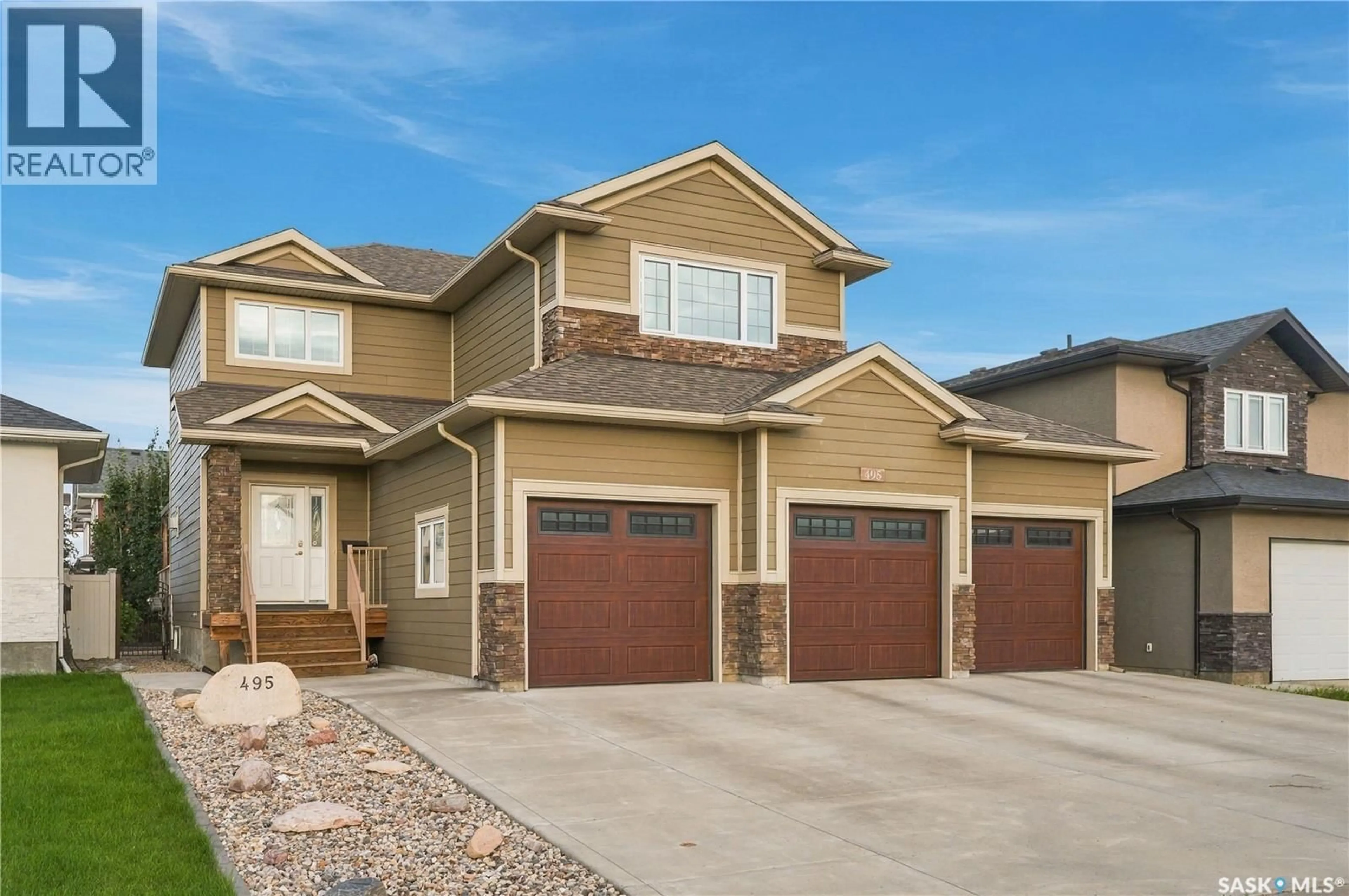 Home with brick exterior material, street for 495 MAHABIR CRESCENT, Saskatoon Saskatchewan S7W0J7