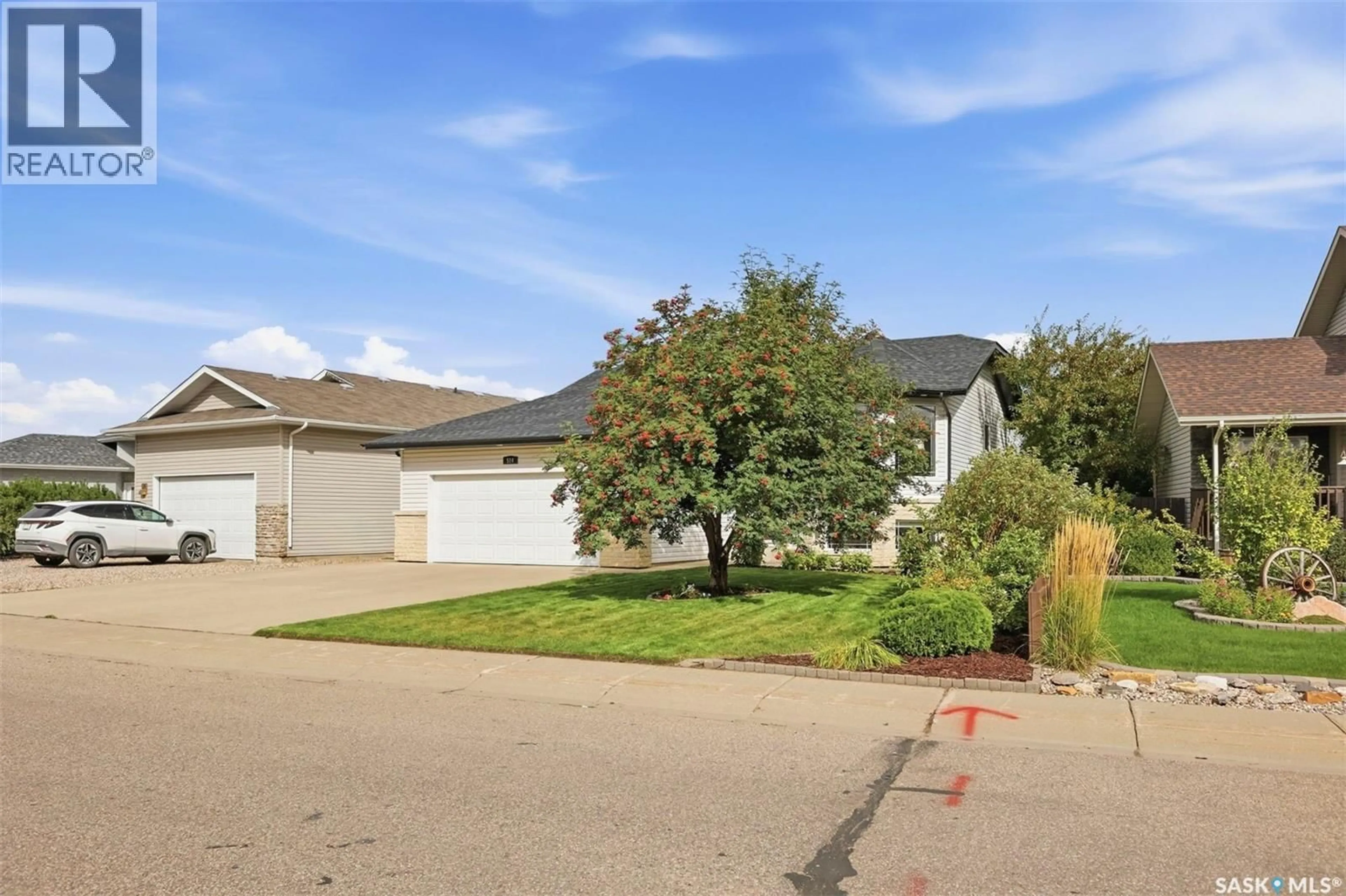 A pic from outside/outdoor area/front of a property/back of a property/a pic from drone, street for N - 514 1ST AVENUE, Warman Saskatchewan S0K4S0