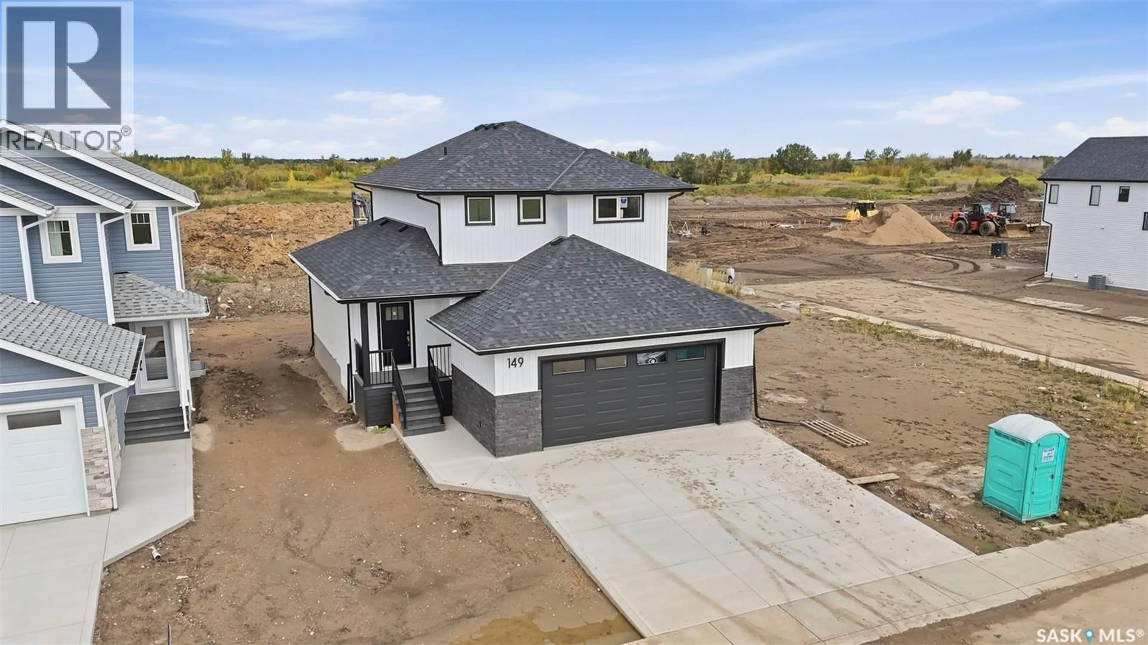 A pic from outside/outdoor area/front of a property/back of a property/a pic from drone, building for 149 EMMA CRESCENT, Martensville Saskatchewan S0K2T0