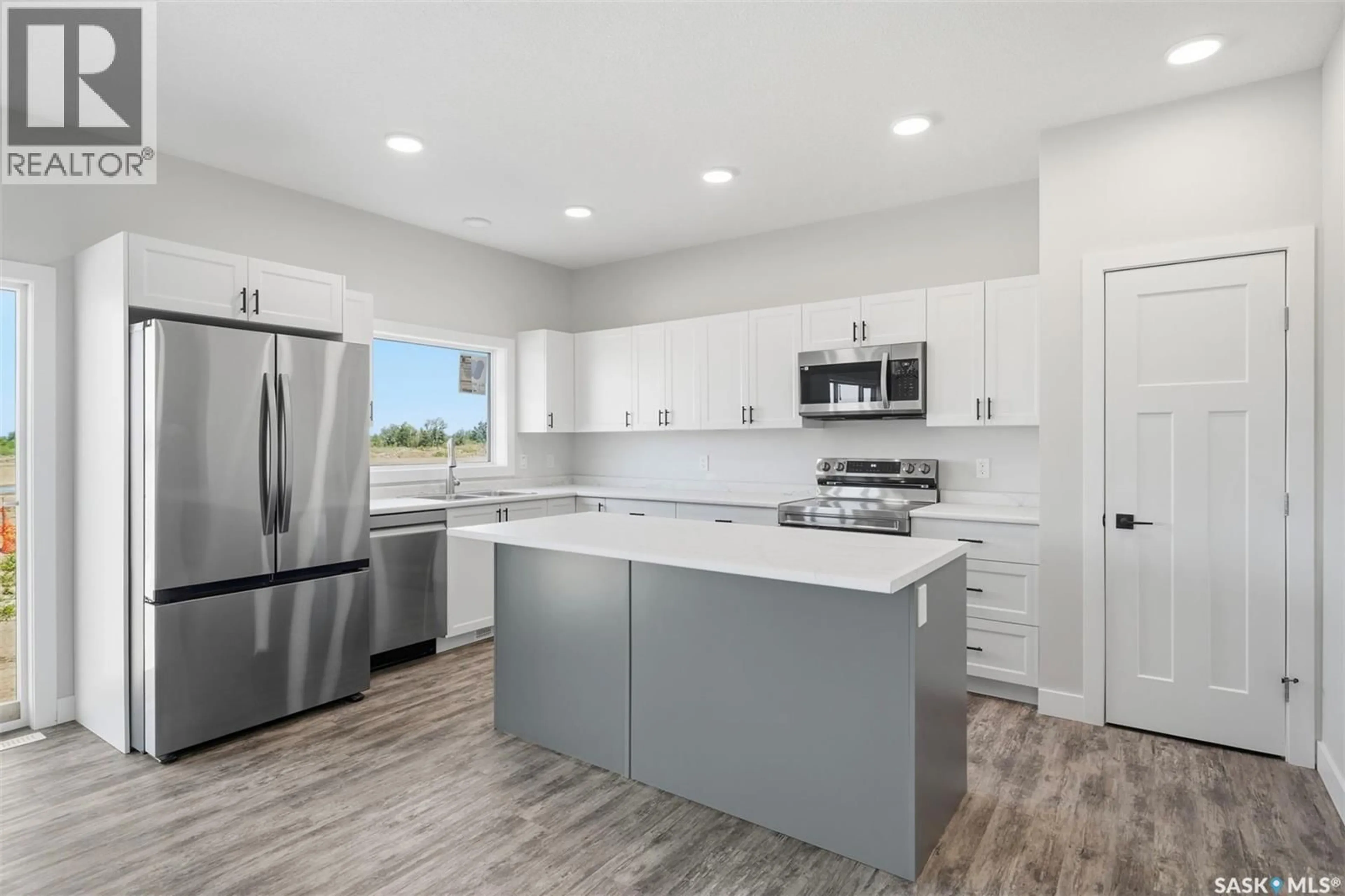 Open concept kitchen, ceramic/tile floor for 149 EMMA CRESCENT, Martensville Saskatchewan S0K2T0