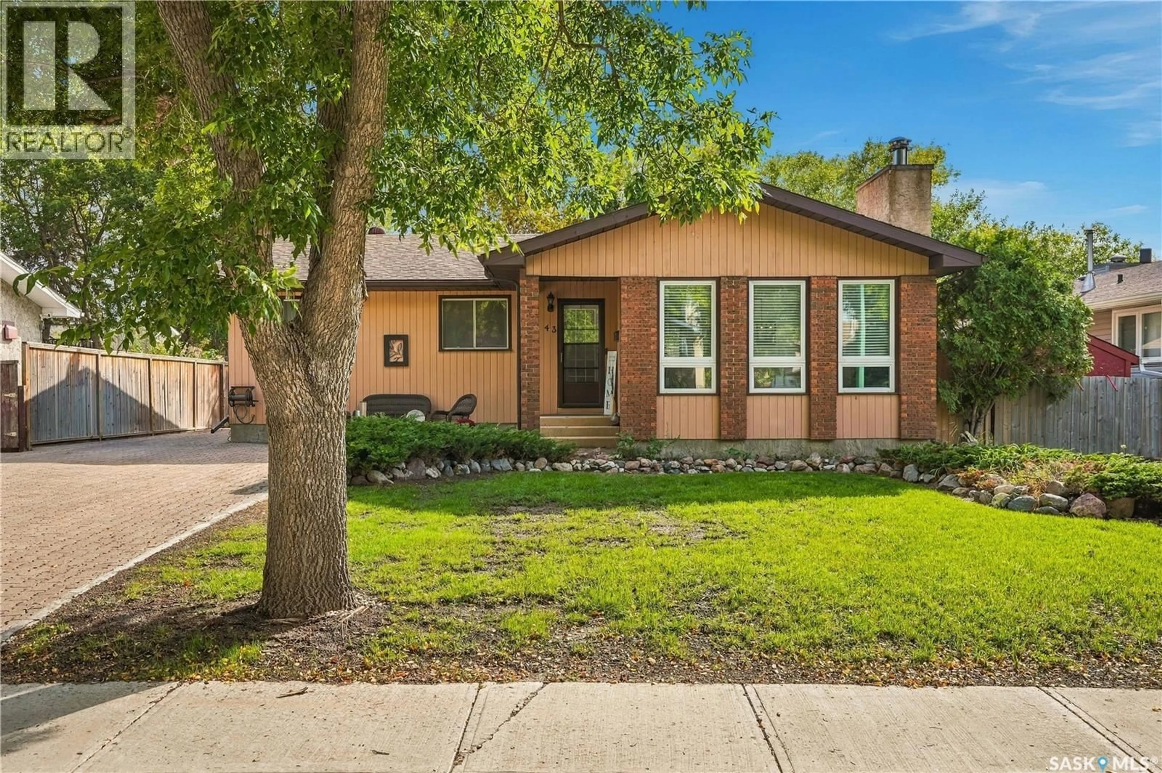 Home with brick exterior material, street for 43 WATTS BAY, Regina Saskatchewan S4N5G6