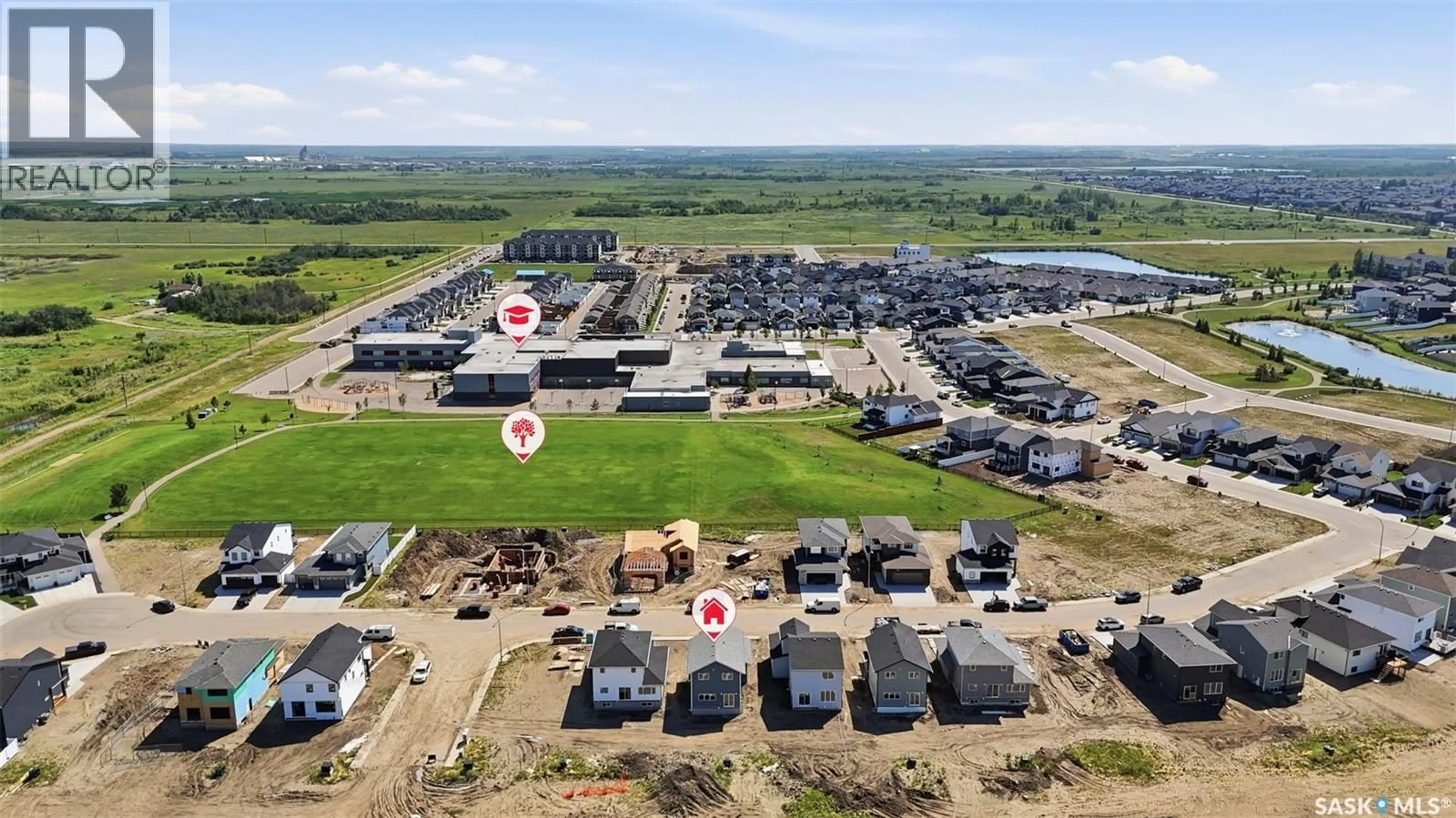 A pic from outside/outdoor area/front of a property/back of a property/a pic from drone, building for 145 EMMA CRESCENT, Martensville Saskatchewan S0K2T0