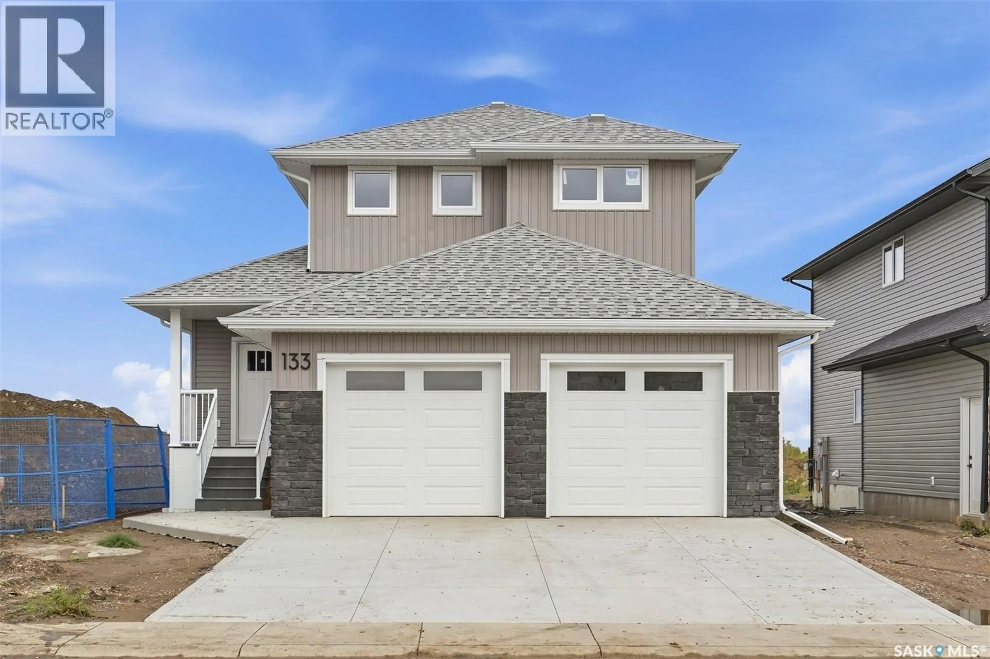 Home with vinyl exterior material, street for 133 EMMA CRESCENT, Martensville Saskatchewan S0K2T0