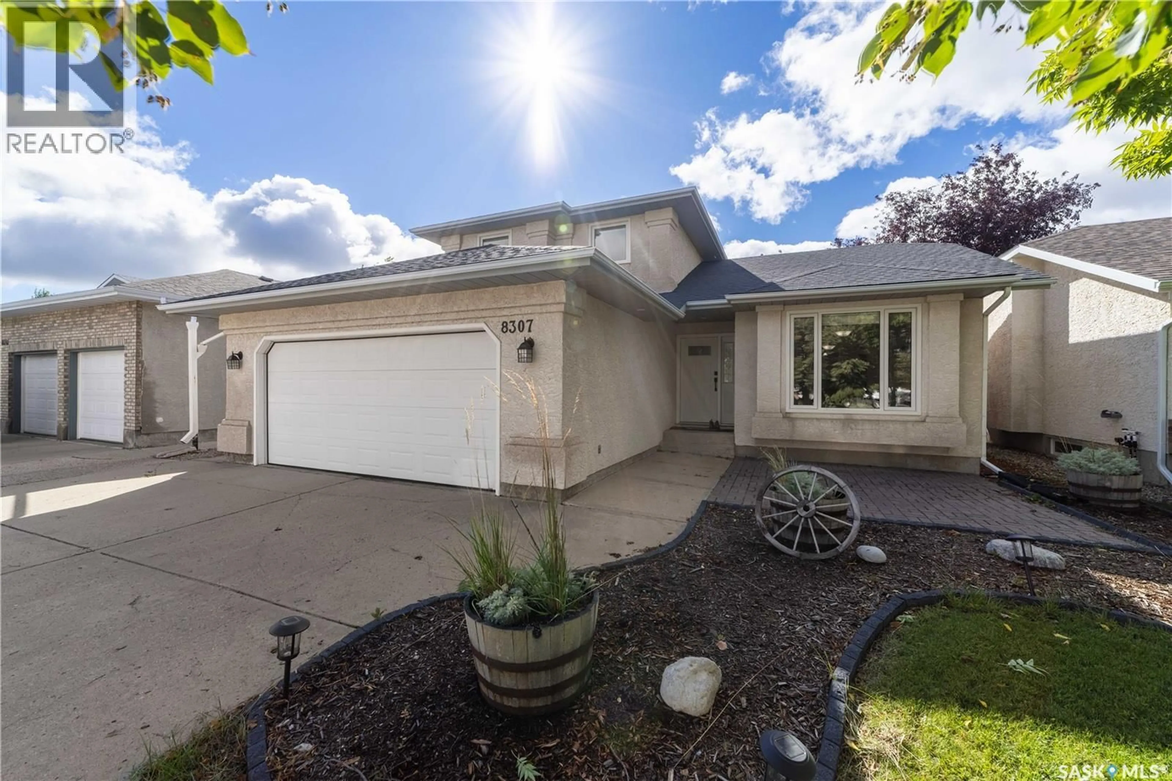 Home with vinyl exterior material, street for 8307 RANKIN DRIVE, Regina Saskatchewan S4Y1J4