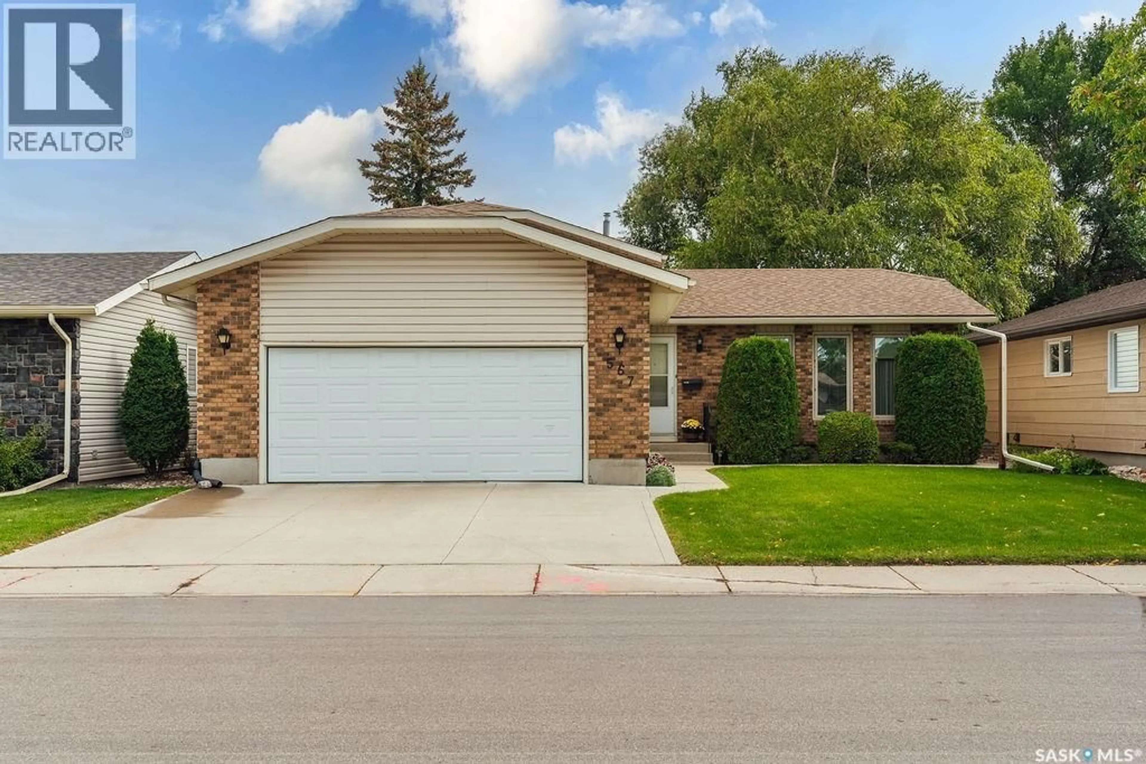 Home with brick exterior material, street for 567 DELARONDE ROAD, Saskatoon Saskatchewan S7J4A7