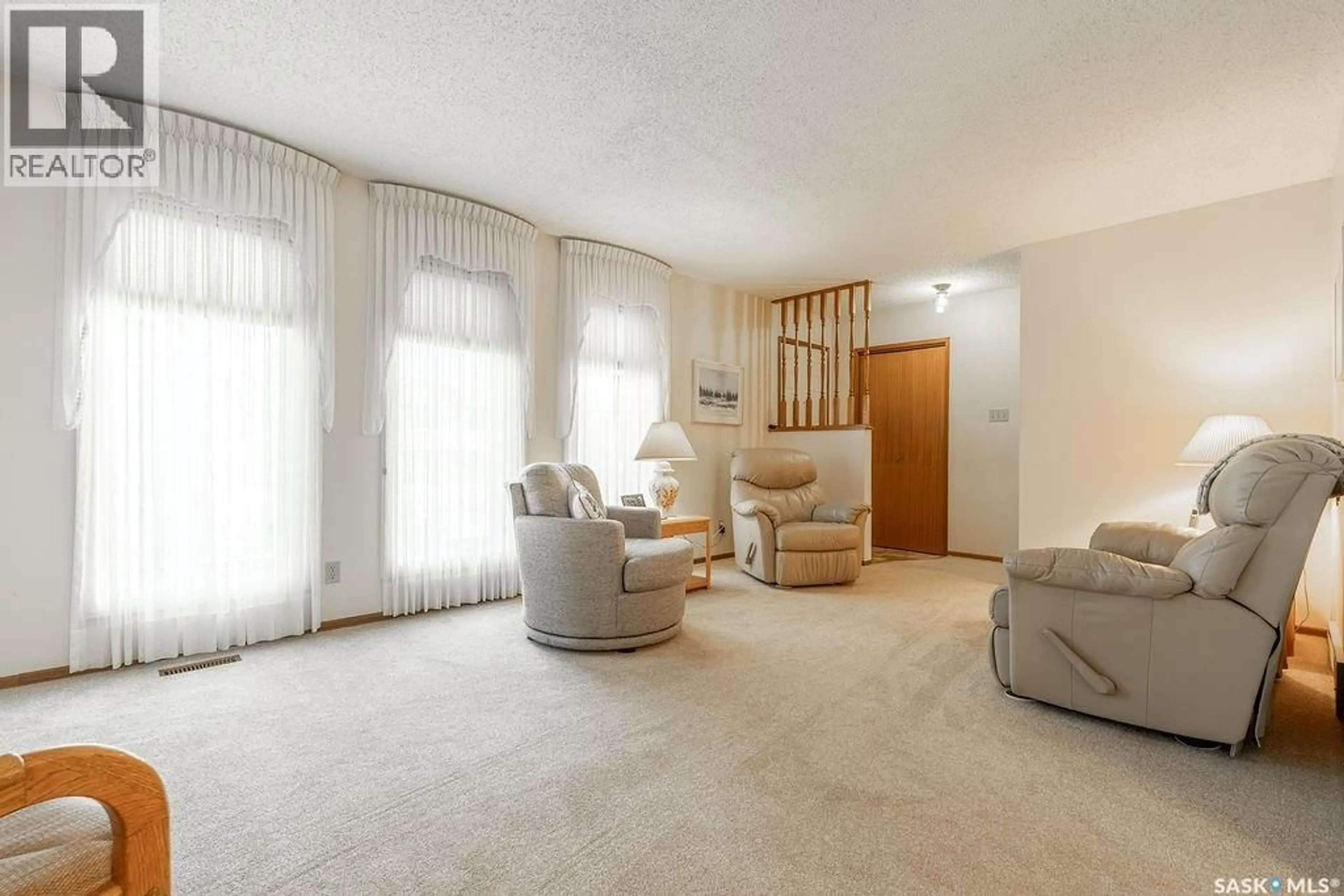 Living room with furniture, unknown for 567 DELARONDE ROAD, Saskatoon Saskatchewan S7J4A7