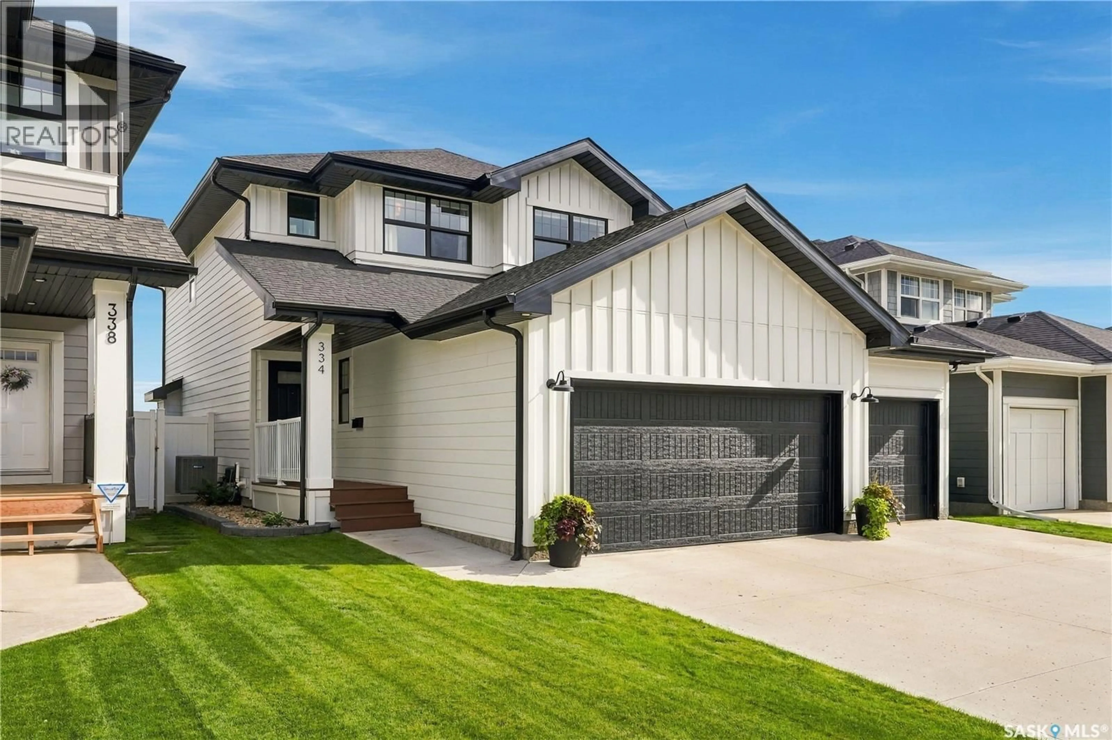 Home with vinyl exterior material, street for 334 STILLING MANOR, Saskatoon Saskatchewan S7V0Y8