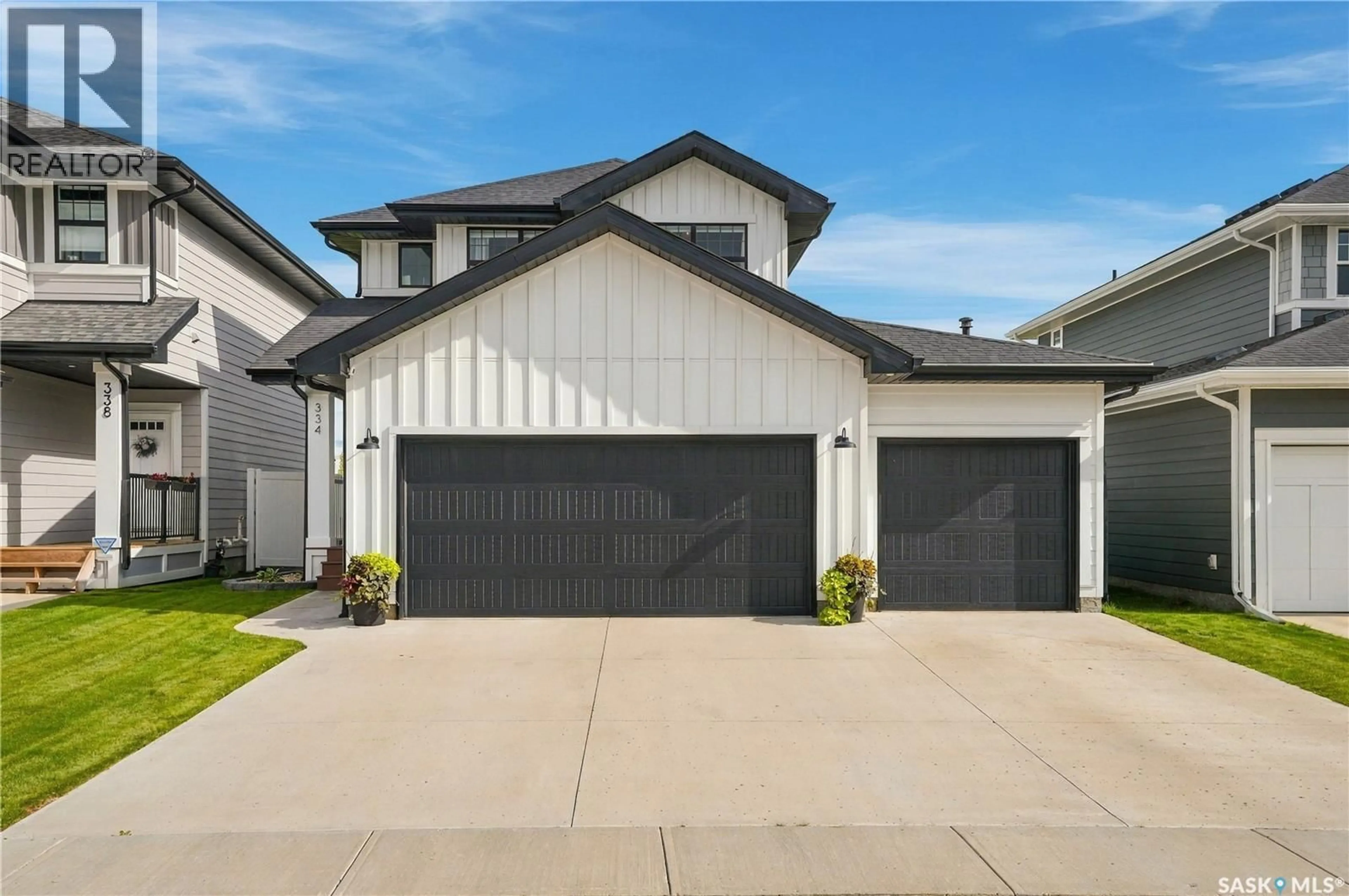 Home with vinyl exterior material, street for 334 STILLING MANOR, Saskatoon Saskatchewan S7V0Y8