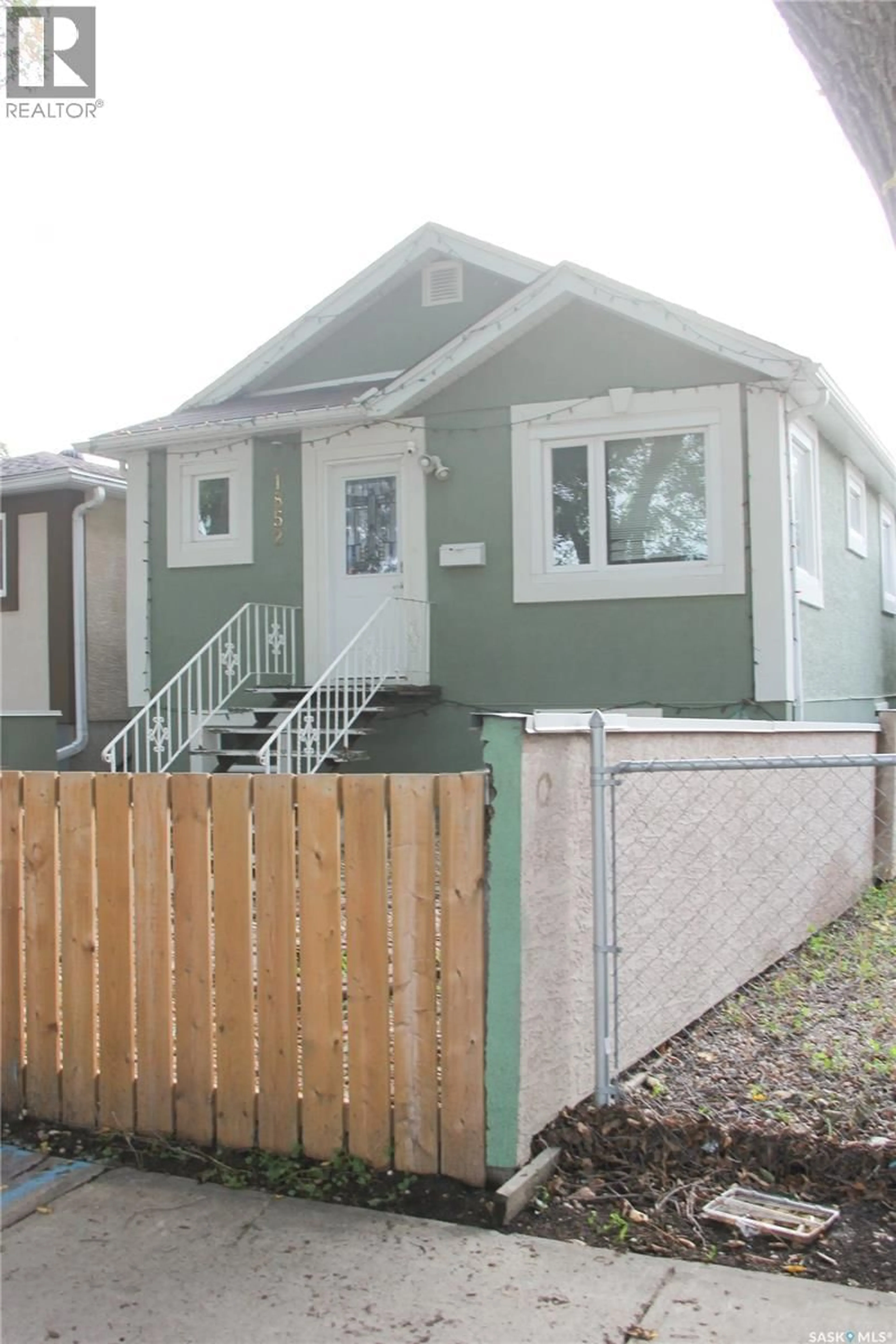 Home with vinyl exterior material, street for 1852 QUEBEC STREET, Regina Saskatchewan S4P1J6