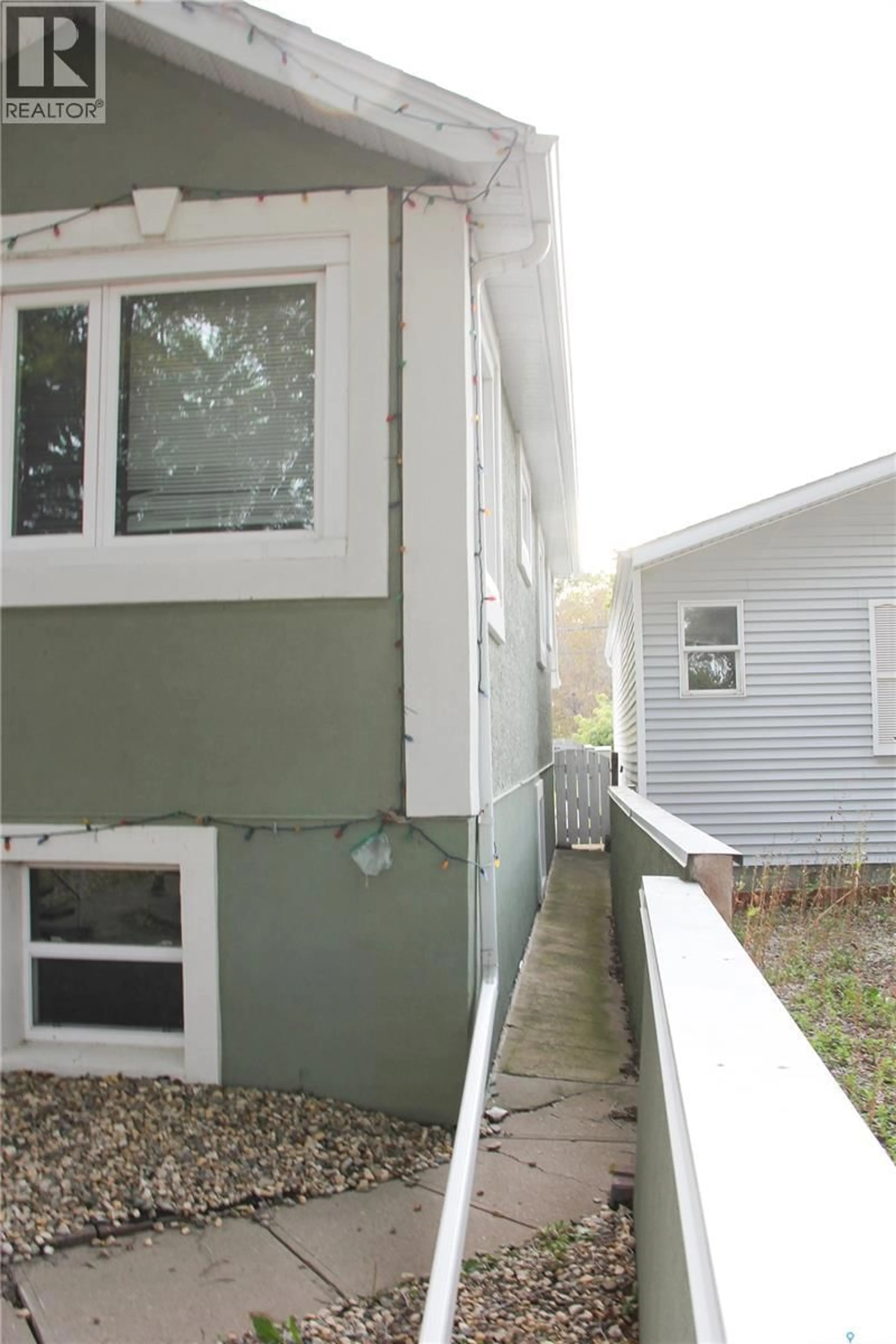 Home with vinyl exterior material, street for 1852 QUEBEC STREET, Regina Saskatchewan S4P1J6