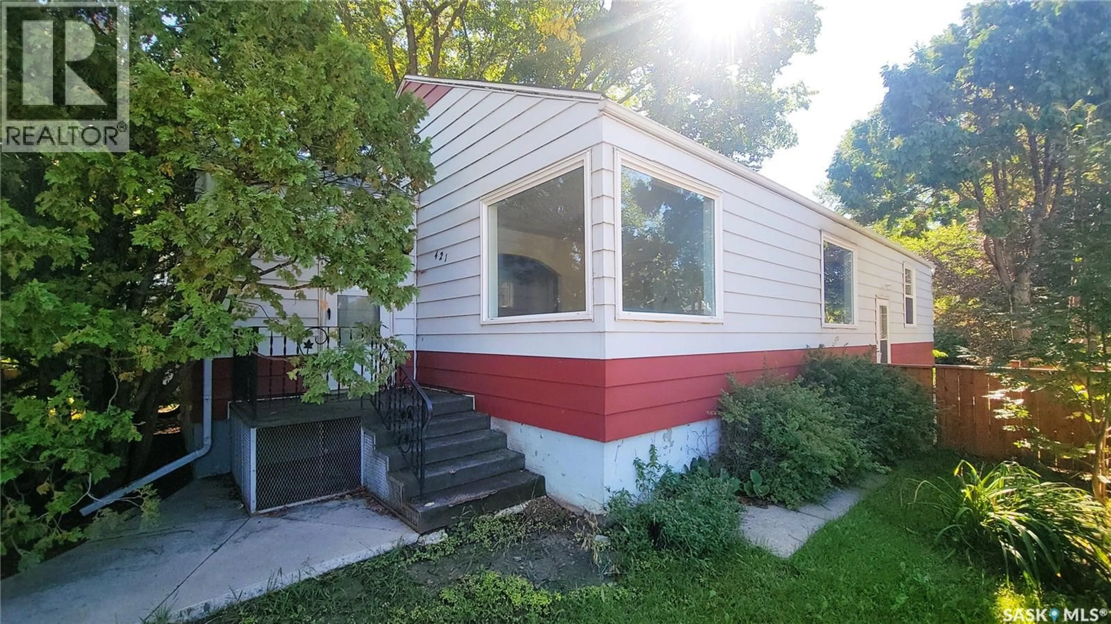 Home with vinyl exterior material, street for 421 29TH STREET, Saskatoon Saskatchewan S7L0M3