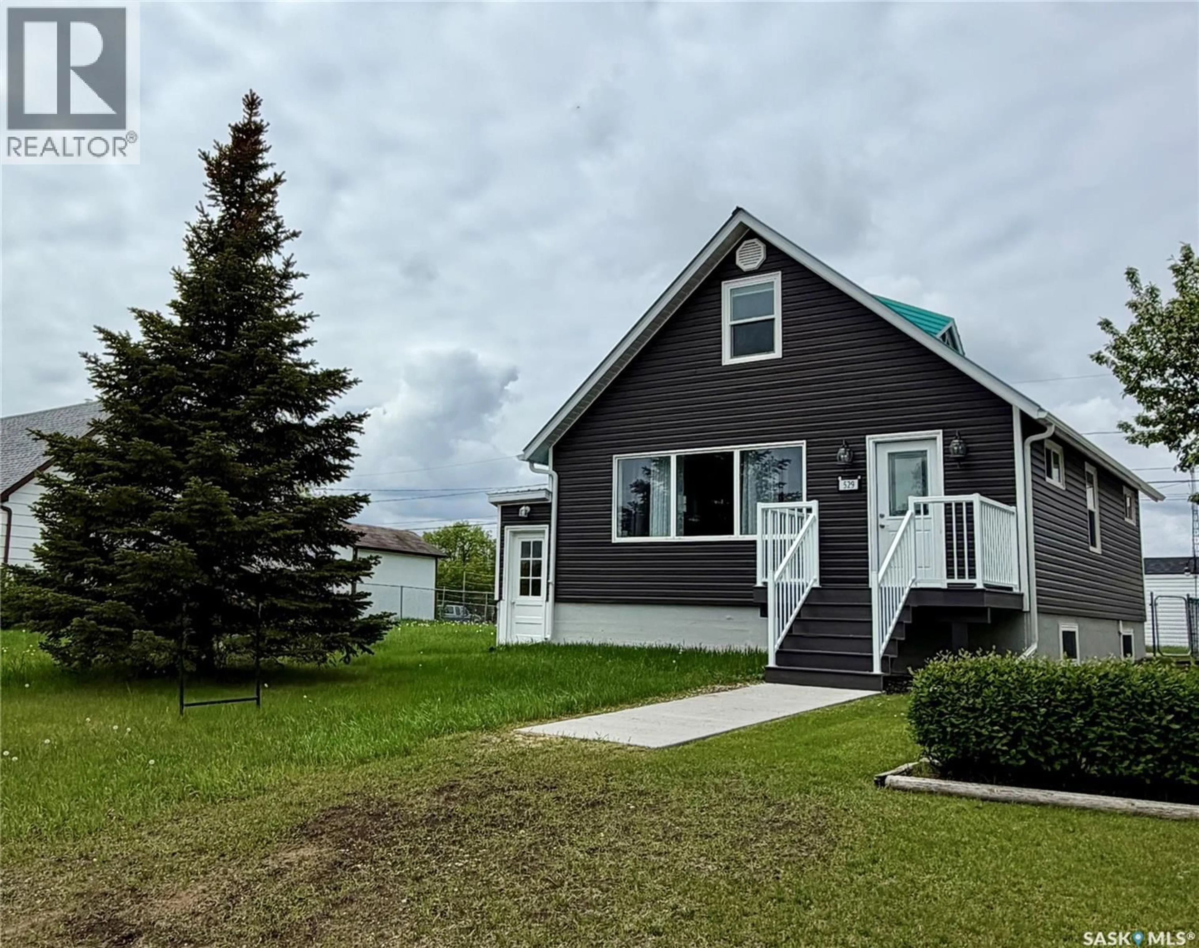 Home with vinyl exterior material, street for 529 ALBERT STREET, Hudson Bay Saskatchewan S0E0Y0