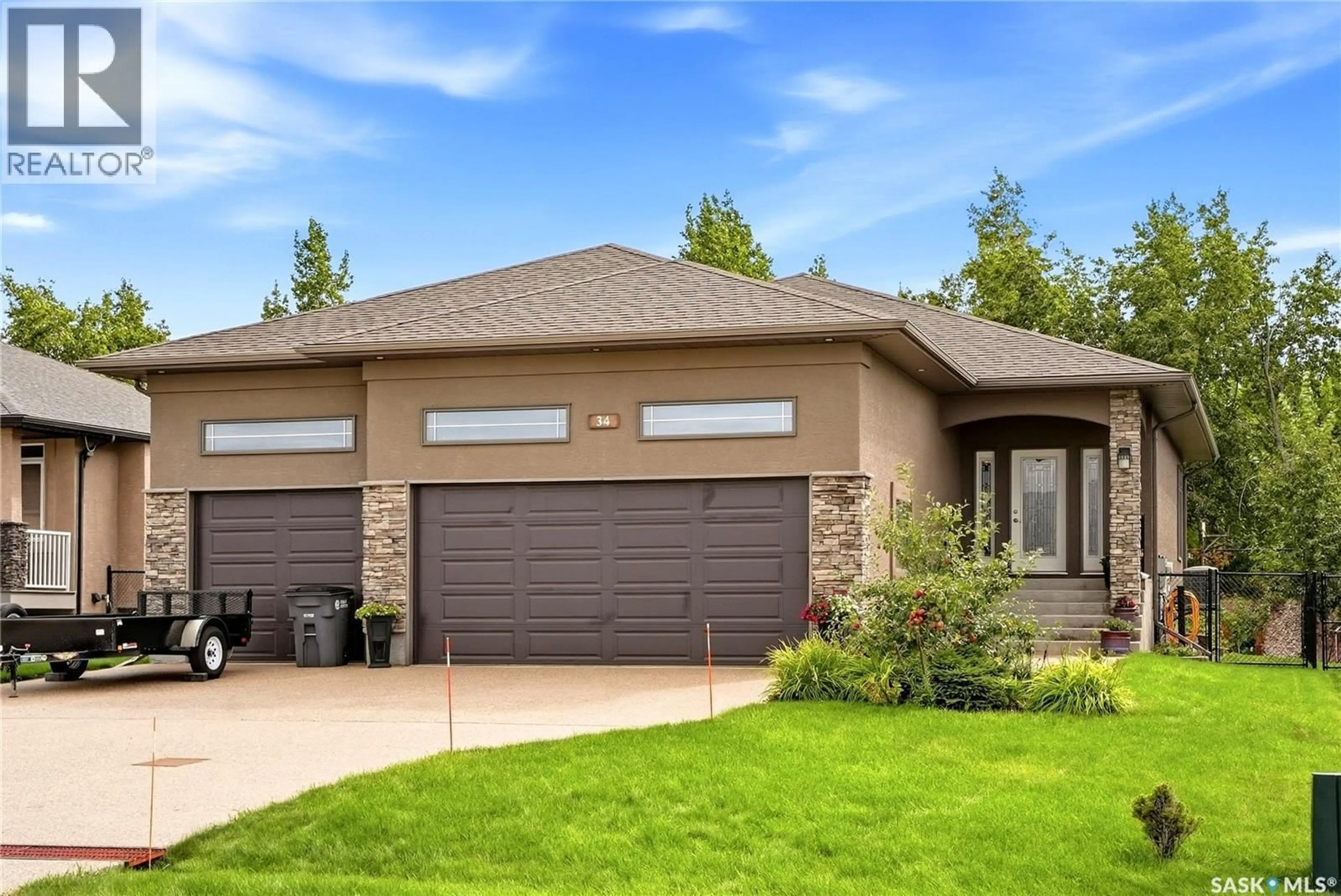 Home with brick exterior material, street for 34 MOTHERWELL DRIVE, White City Saskatchewan S4L0C5