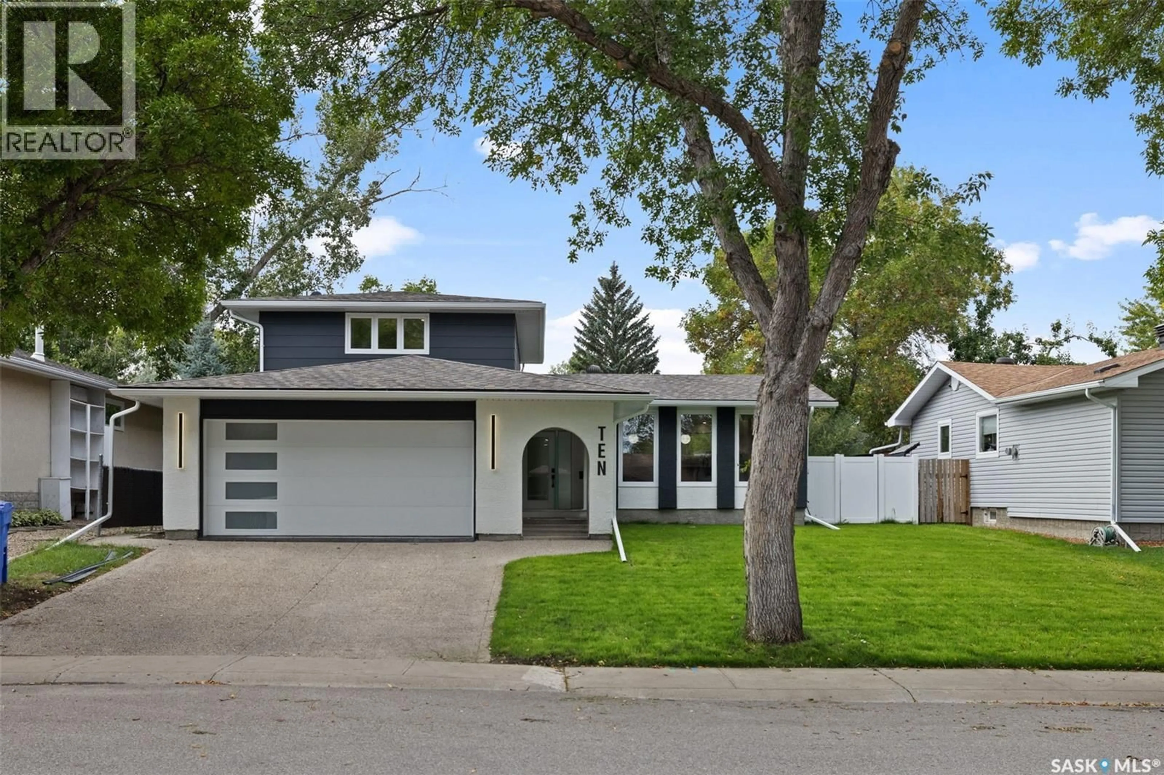 Home with vinyl exterior material, street for 10 SELKIRK CRESCENT, Regina Saskatchewan S4S6J4